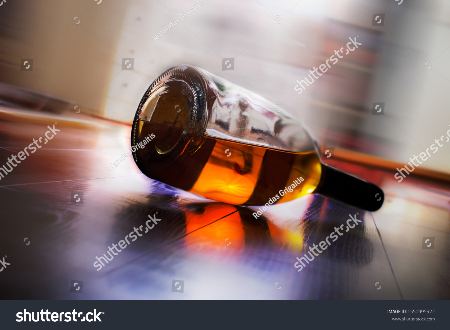 Alcohol Bottle Lying On Floor Stock Photo 1550995922 | Shutterstock