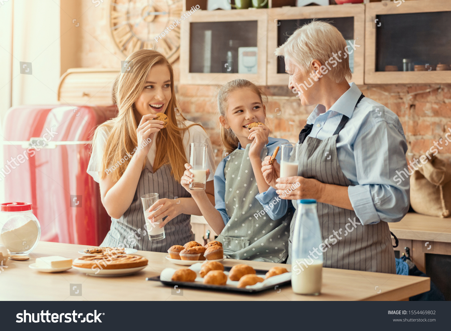 Positive Daughter Mother Grandmother Drinking Milk Stock Photo ...