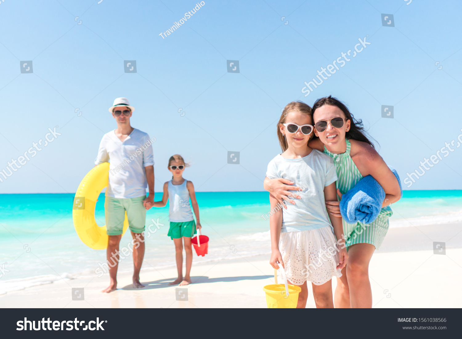 Happy Family On Beach During Summer Stock Photo 1561038566 | Shutterstock