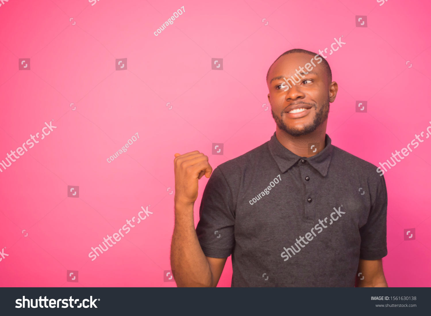 Young Black Man Pointing Behind Him Stock Photo 1561630138 | Shutterstock