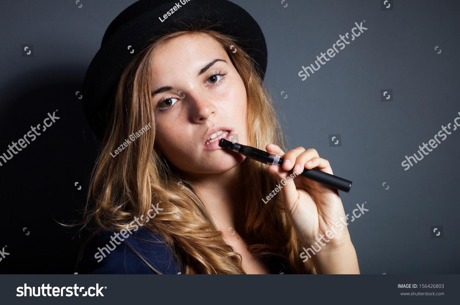 Elegant Woman Smoking Ecigarette Wearing Suit Stock Photo 156426803 ...