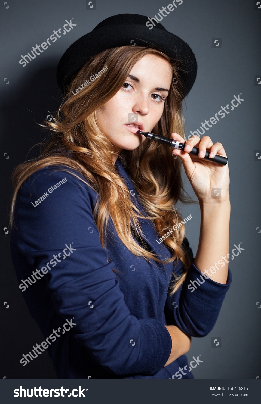 Elegant Woman Smoking Ecigarette Wearing Suit Stock Photo 156426815 ...