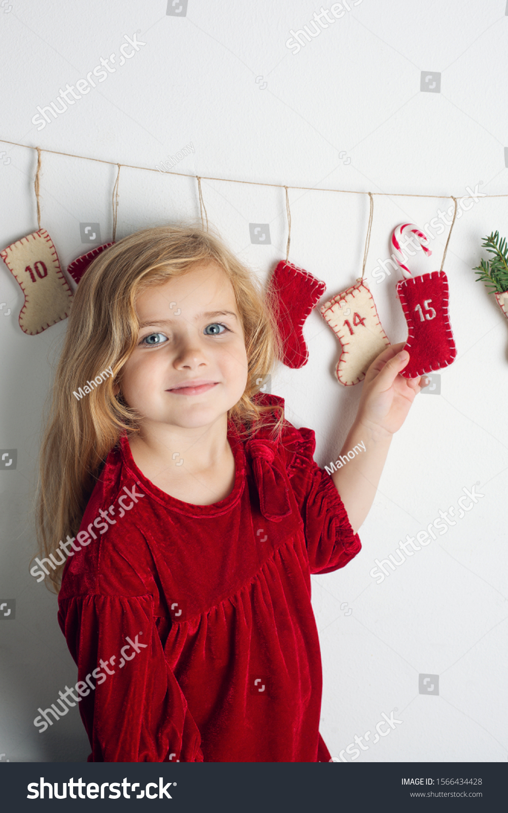 Little Girl Advent Calendar Hanging On Stock Photo 1566434428