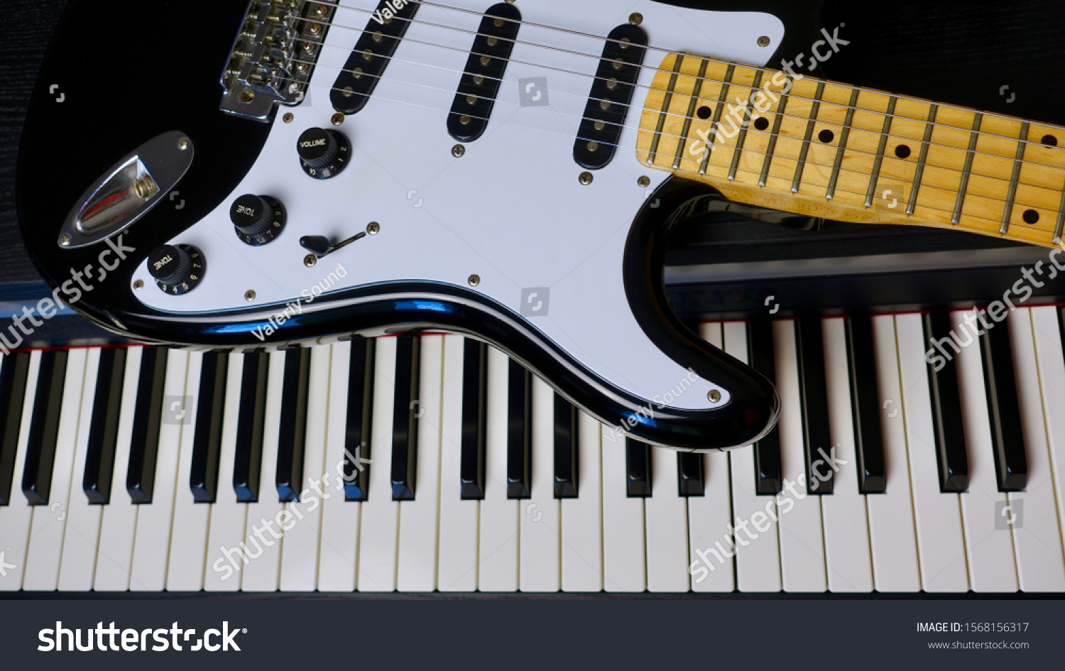 electric guitar on keyboard