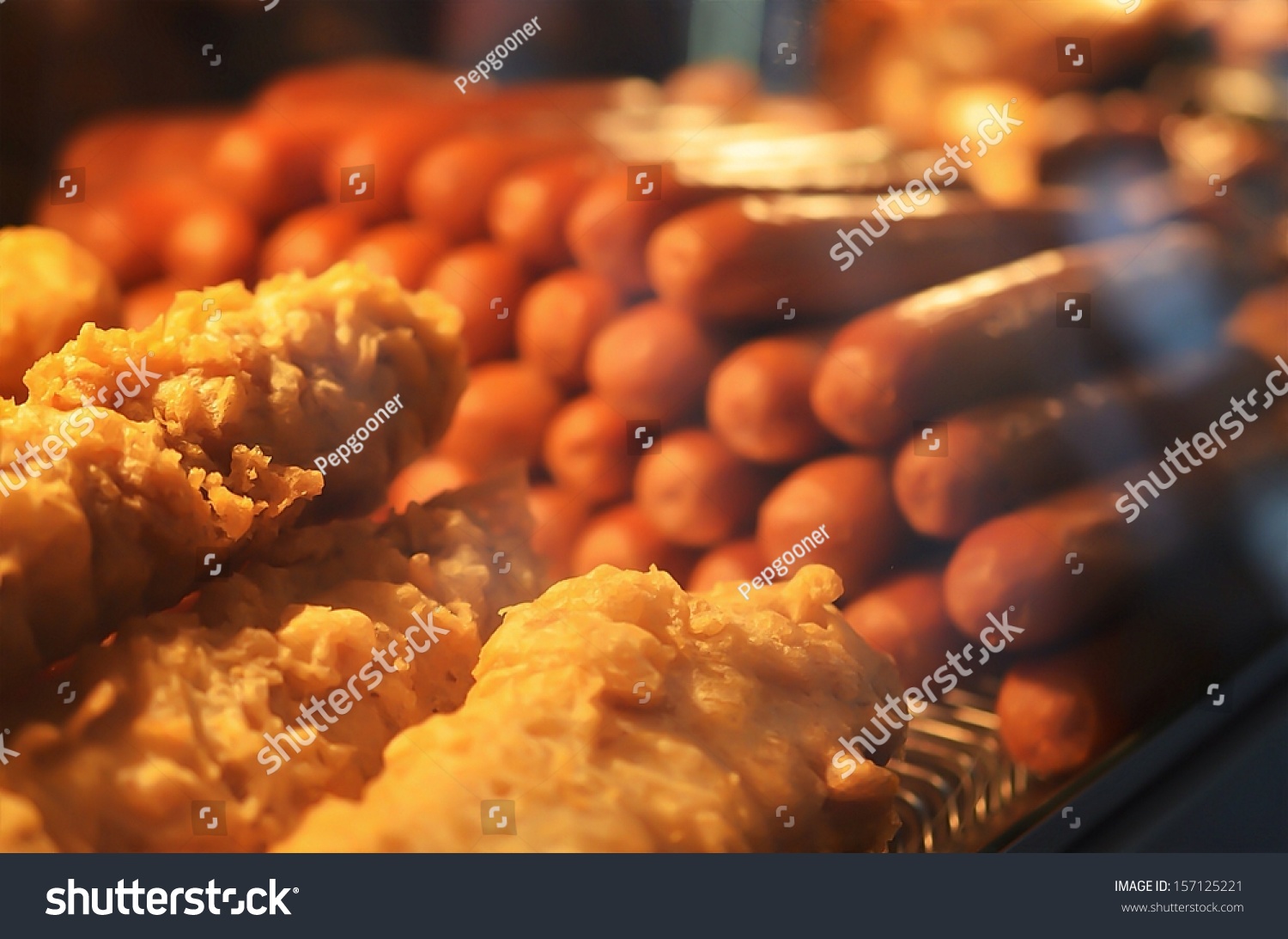 battered-fish-sausages-fish-chip-shop-stock-photo-157125221-shutterstock