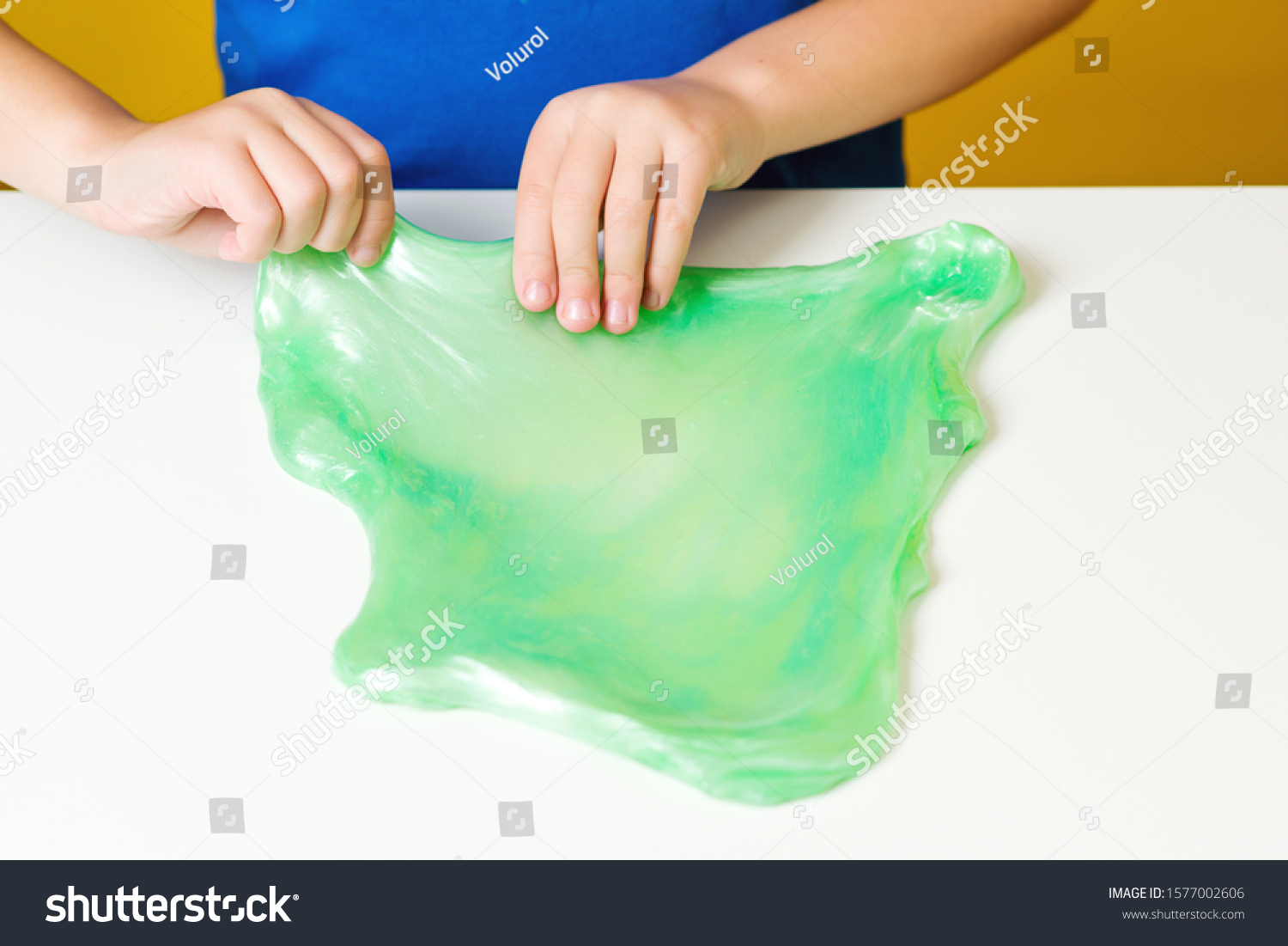 Child Plays Green Slime On White Stock Photo 1577002606 | Shutterstock