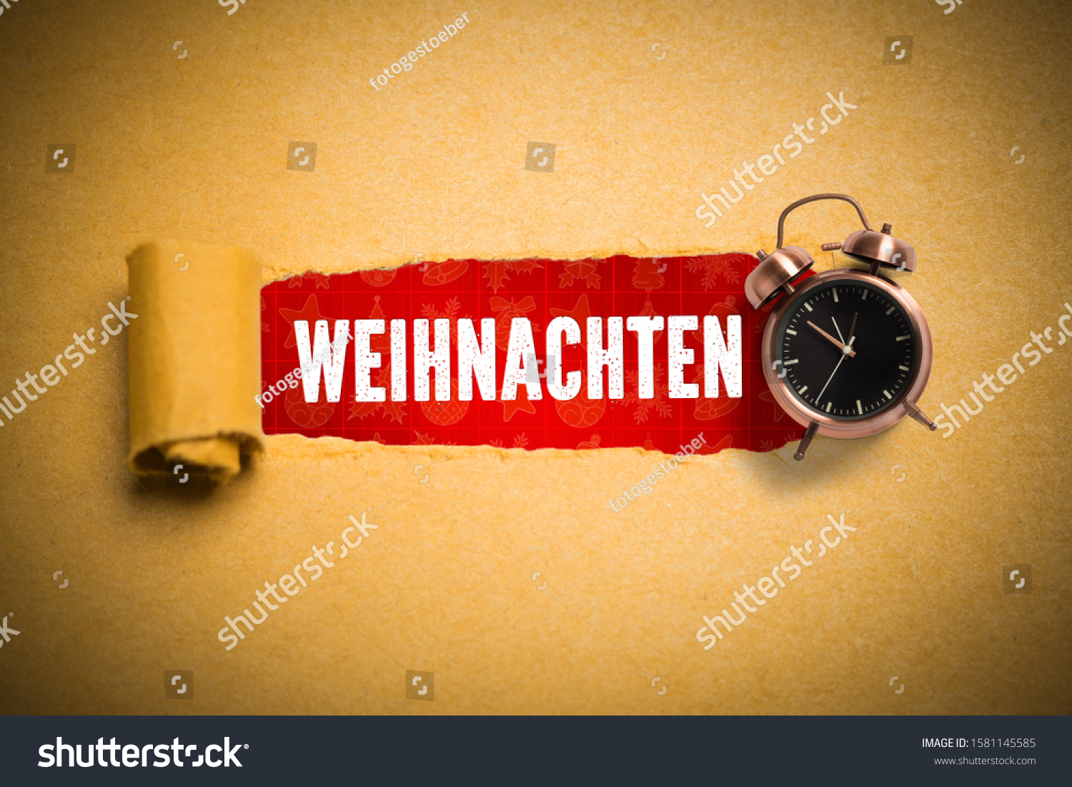 torn-paper-revealing-german-word-christmas-stock-photo-1581145585