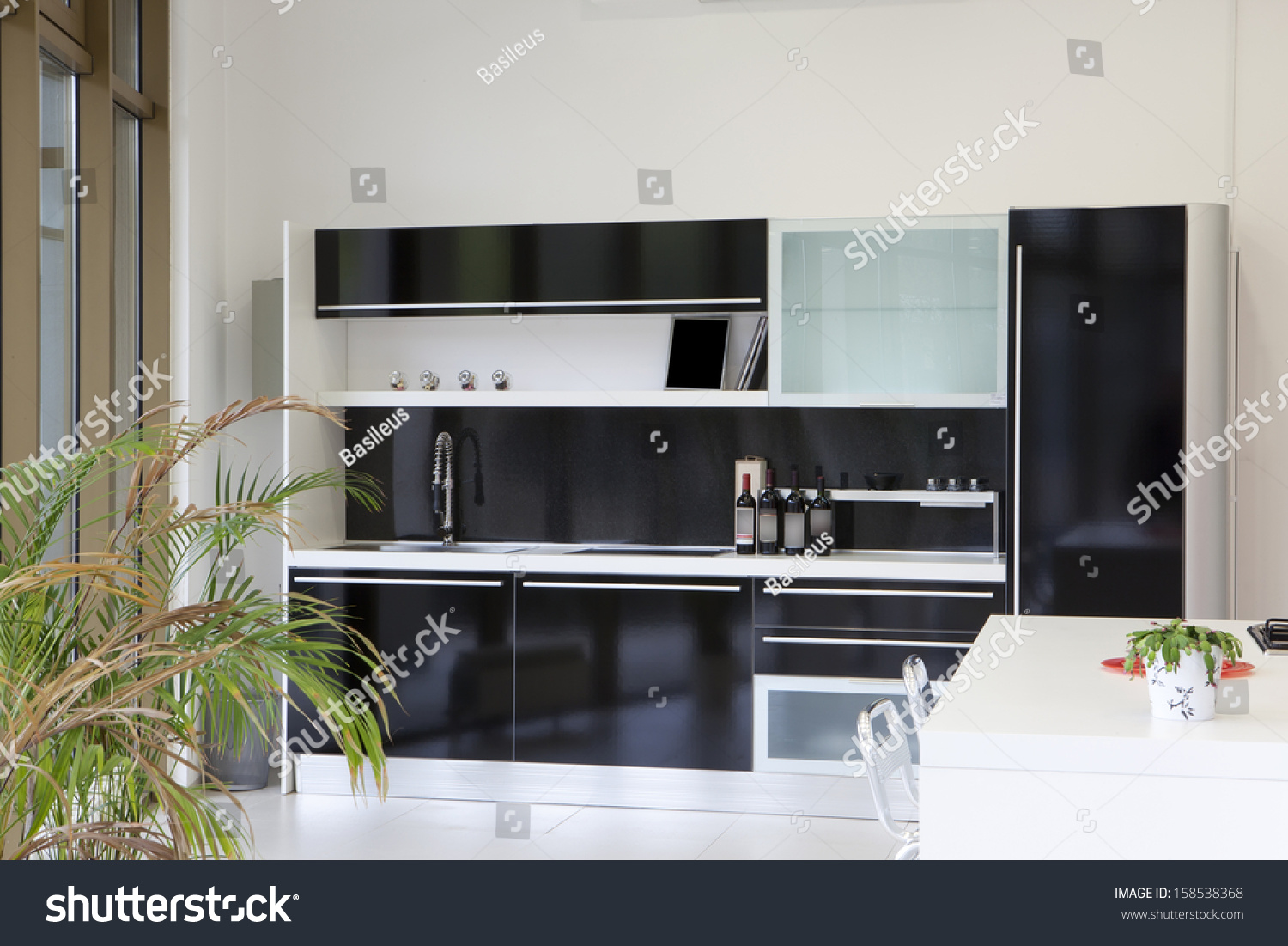 stock-photo-modern-black-kitchen-design-158538368.jpg