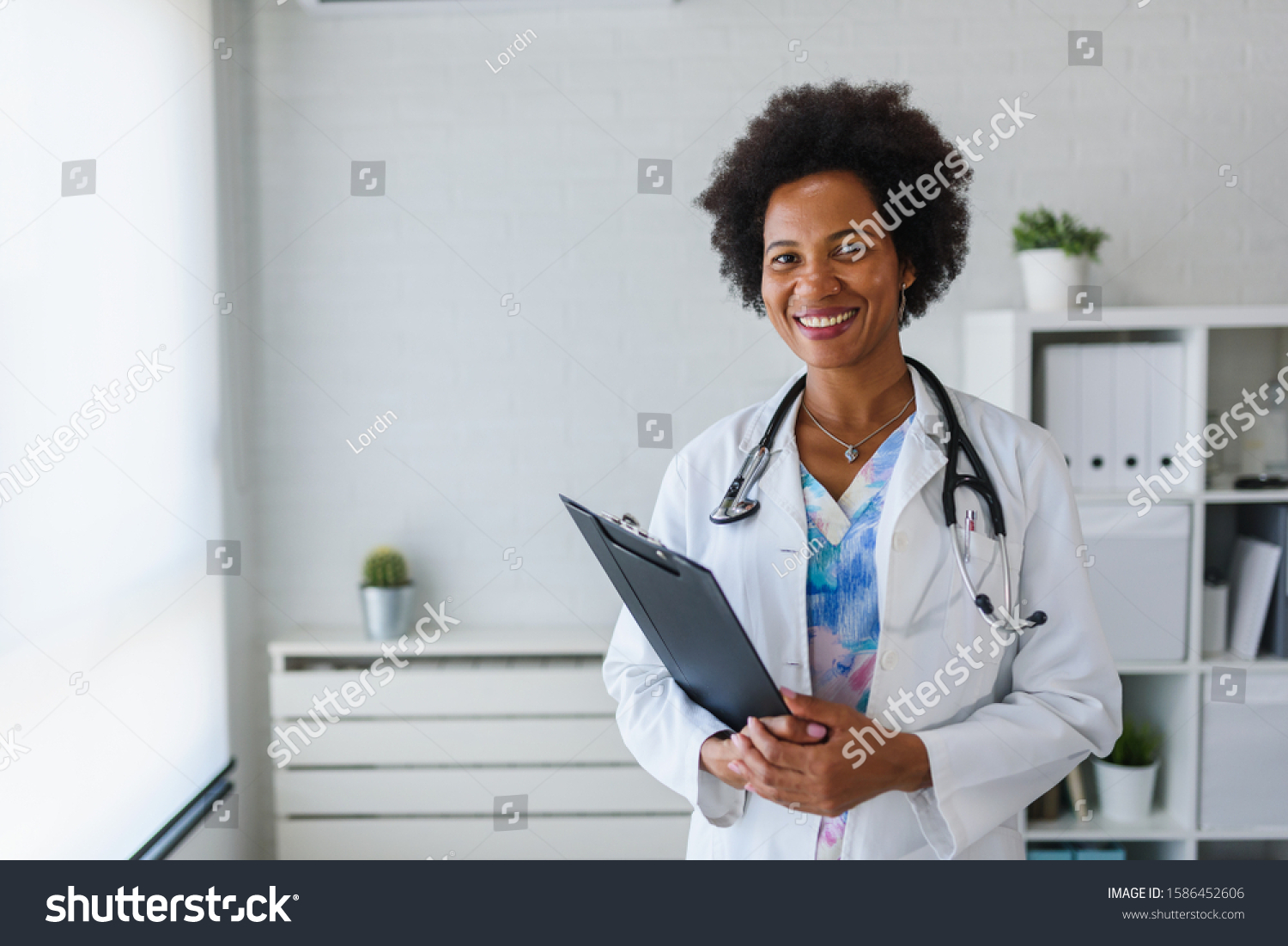 Portrait Female African American Doctor Standing Stock Photo 1586452606 ...