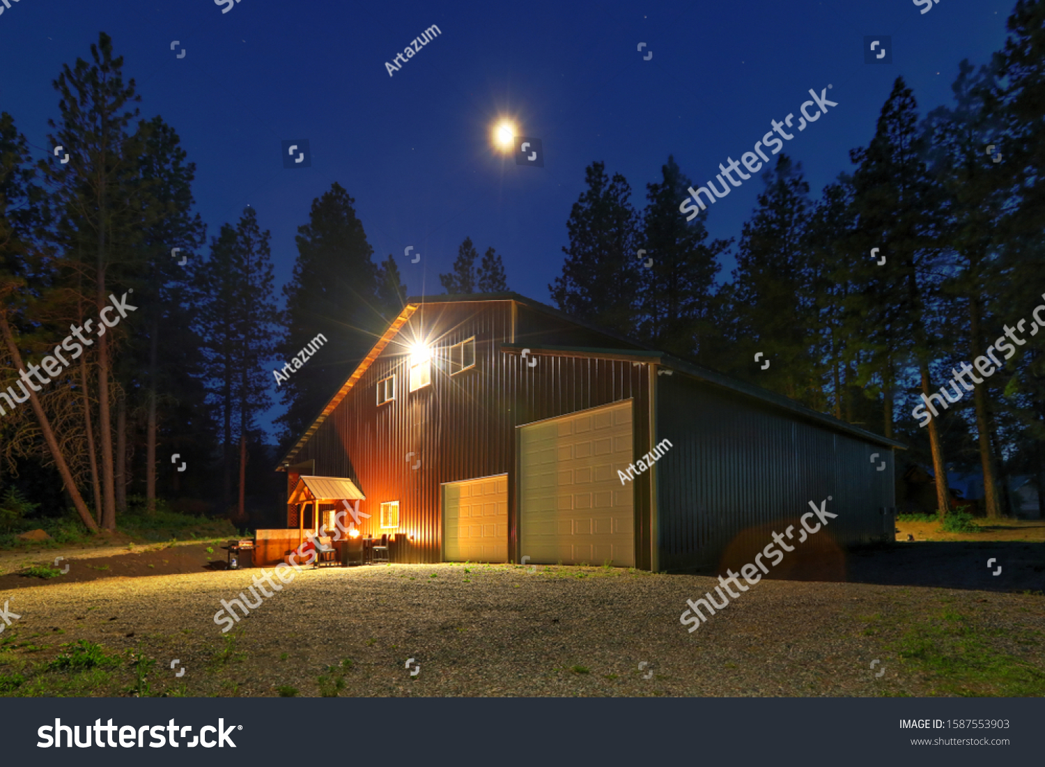 Stock Photo Front Entrance To Large Metal Shop Barn Building With Guest House And Cozy Outdoor Set Up 1587553903 