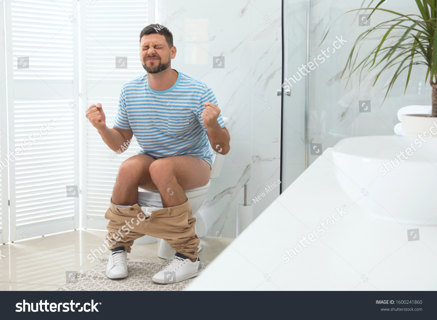 Man Suffering Hemorrhoid On Toilet Bowl Stock Photo 1600241860 ...