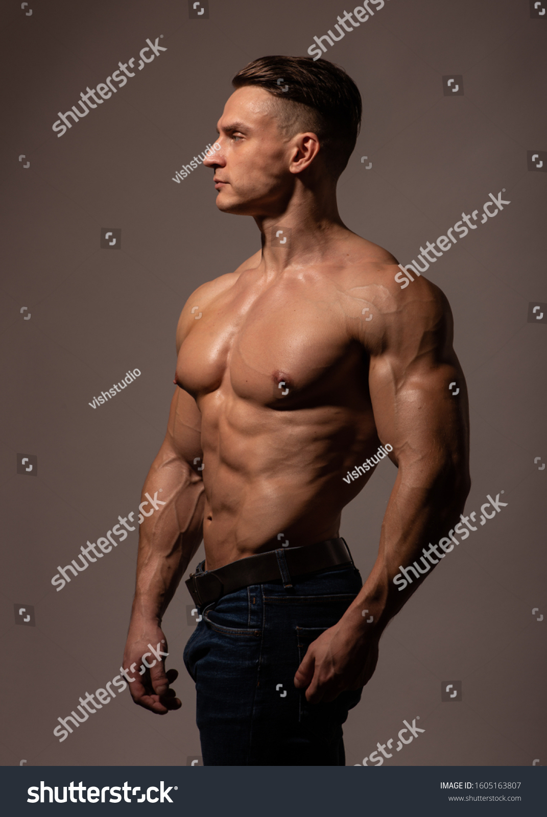 Athletic Shirtless Male Model Flexing Muscles Stock Photo 1605163807 ...