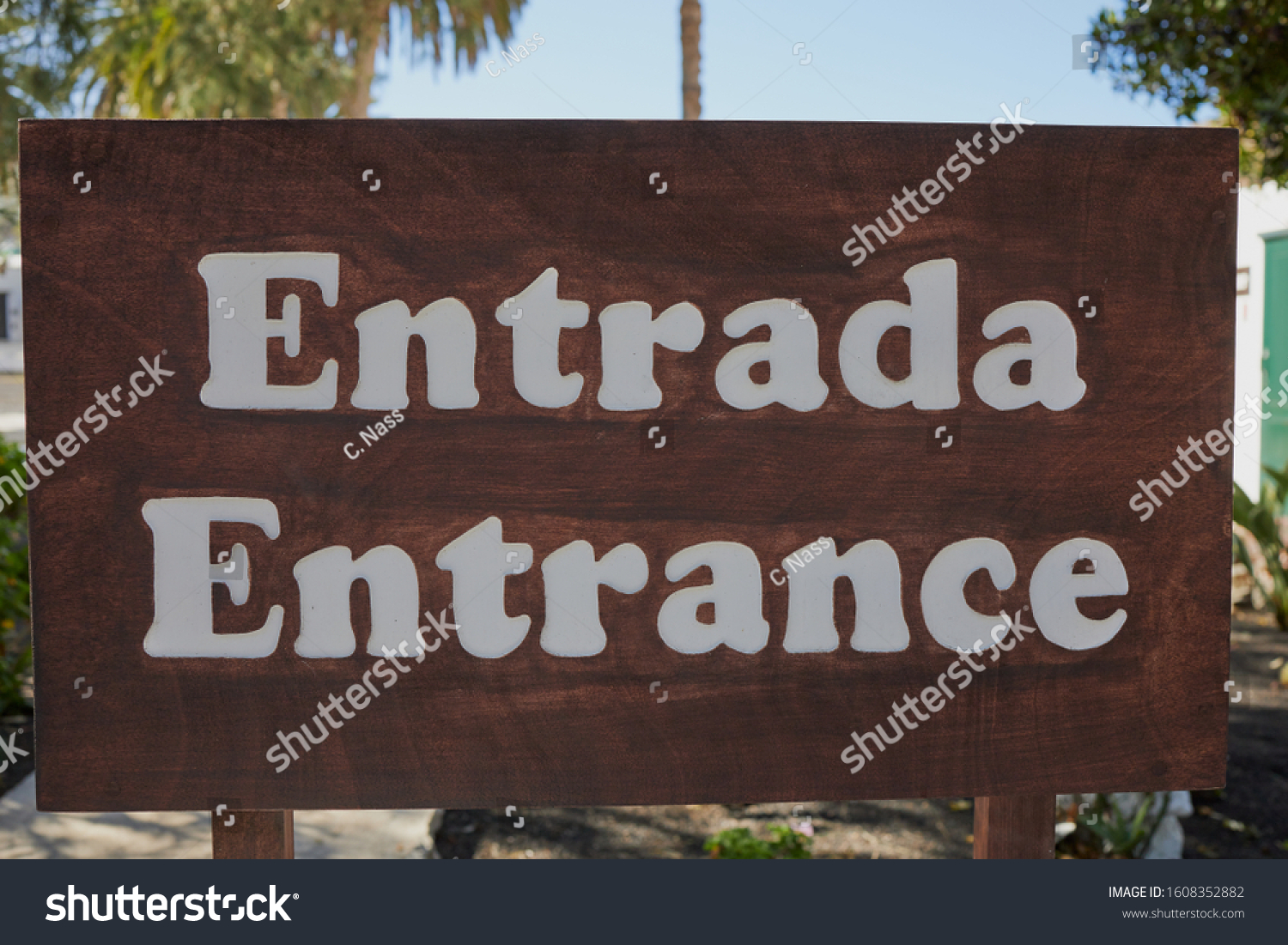 spanish-english-word-entrance-written-on-stock-photo-1608352882