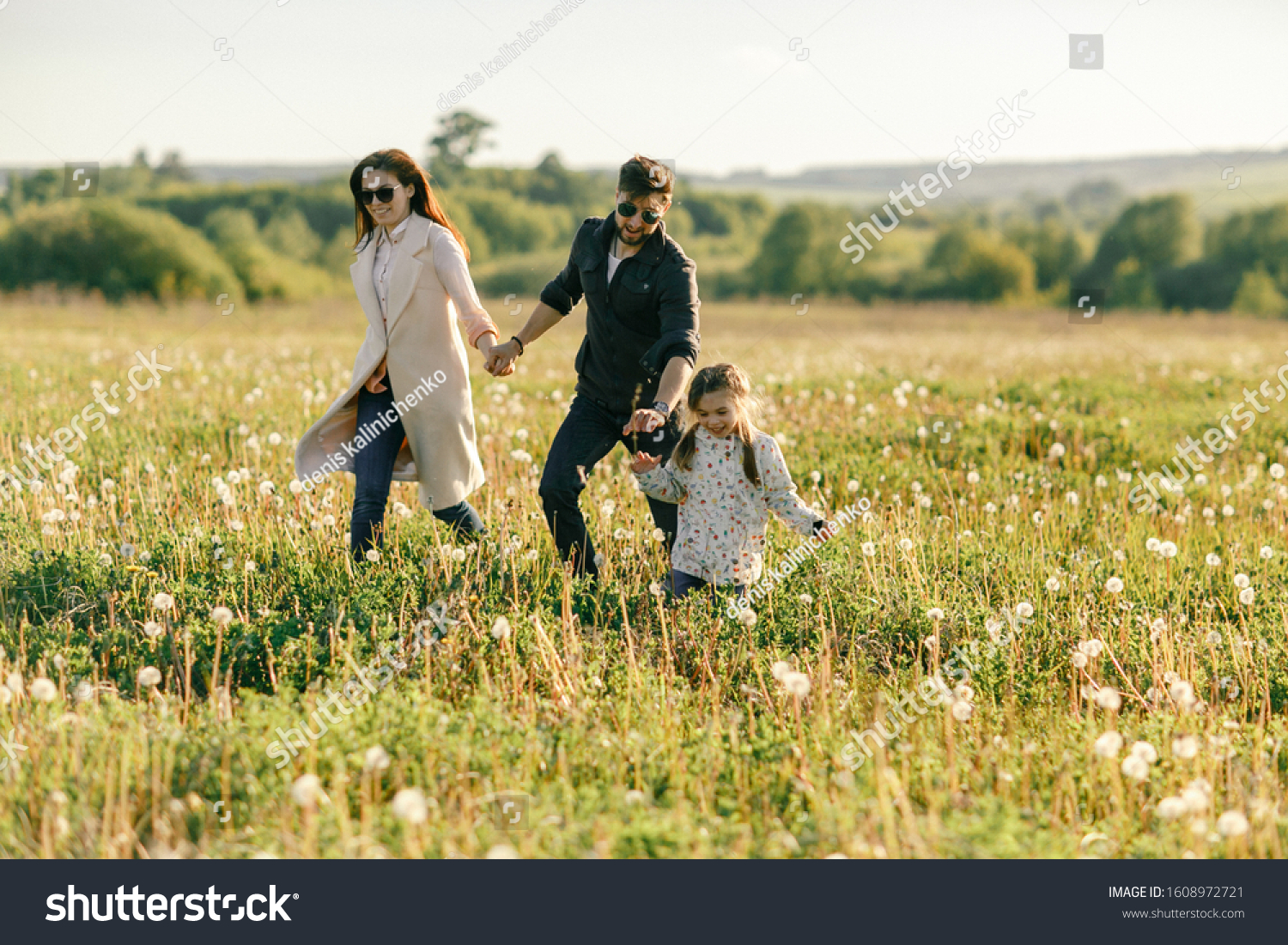 happy-family-father-mother-child-daughter-stock-photo-1608972721