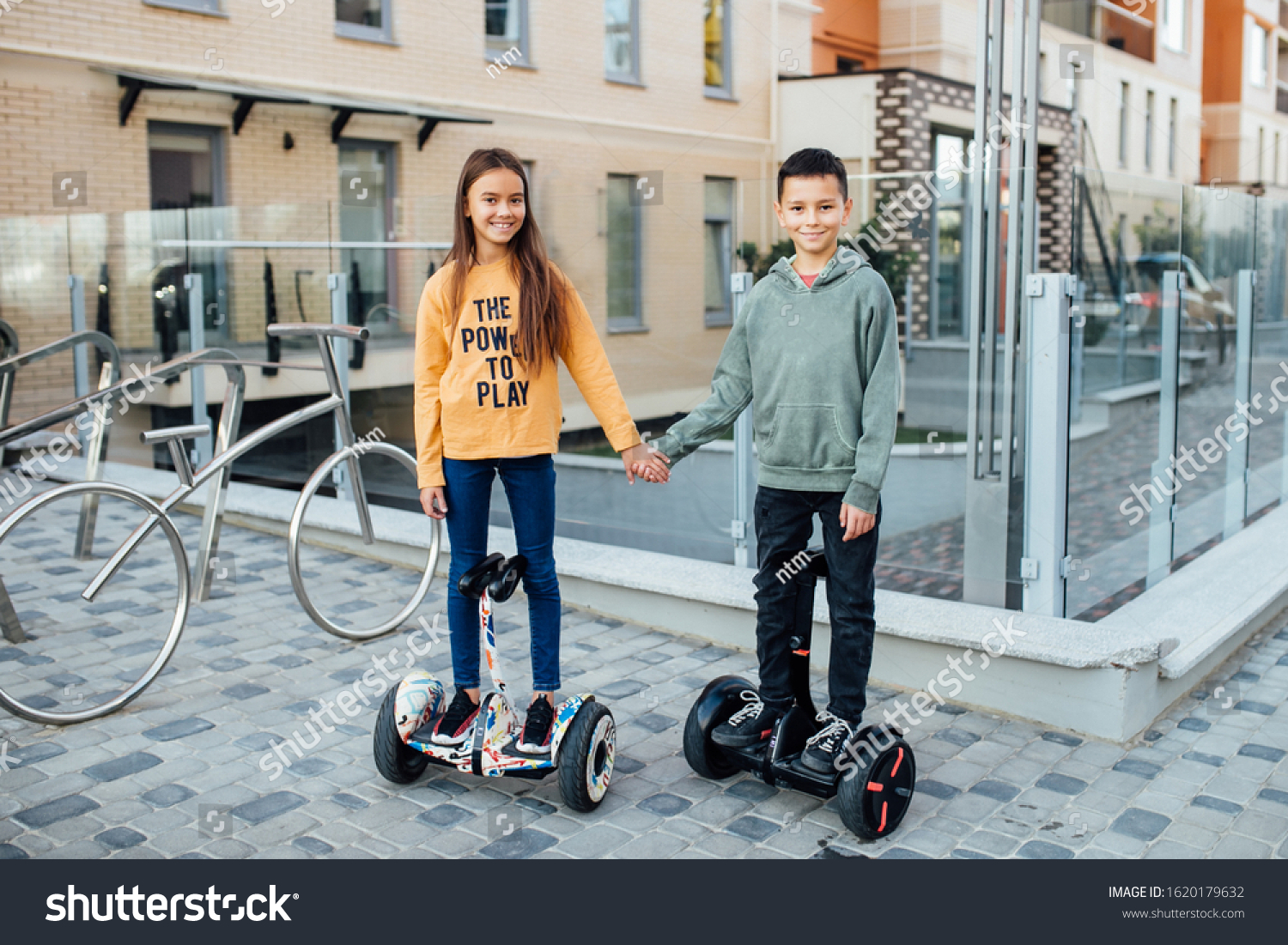 kid with speaker on hoverboard