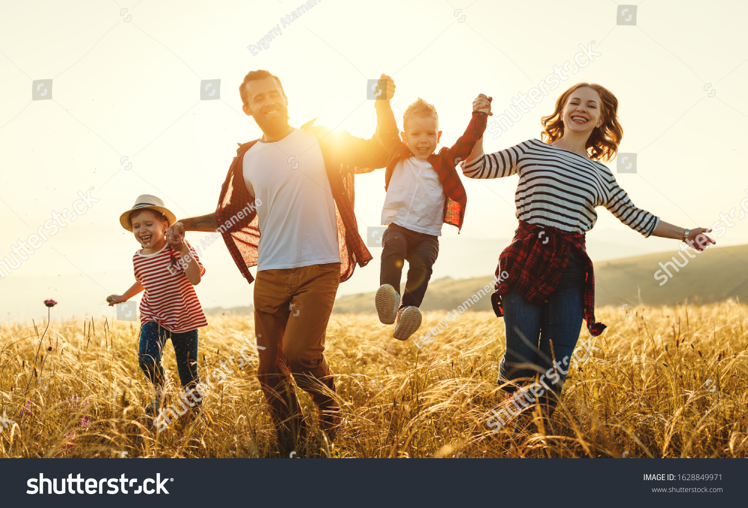 happy-family-father-mother-child-son-foto-stok-1628849971-shutterstock