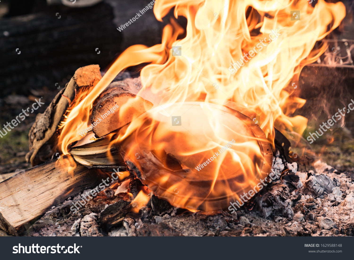 closeup-shot-fire-flames-on-blurred-stock-photo-1629588148-shutterstock