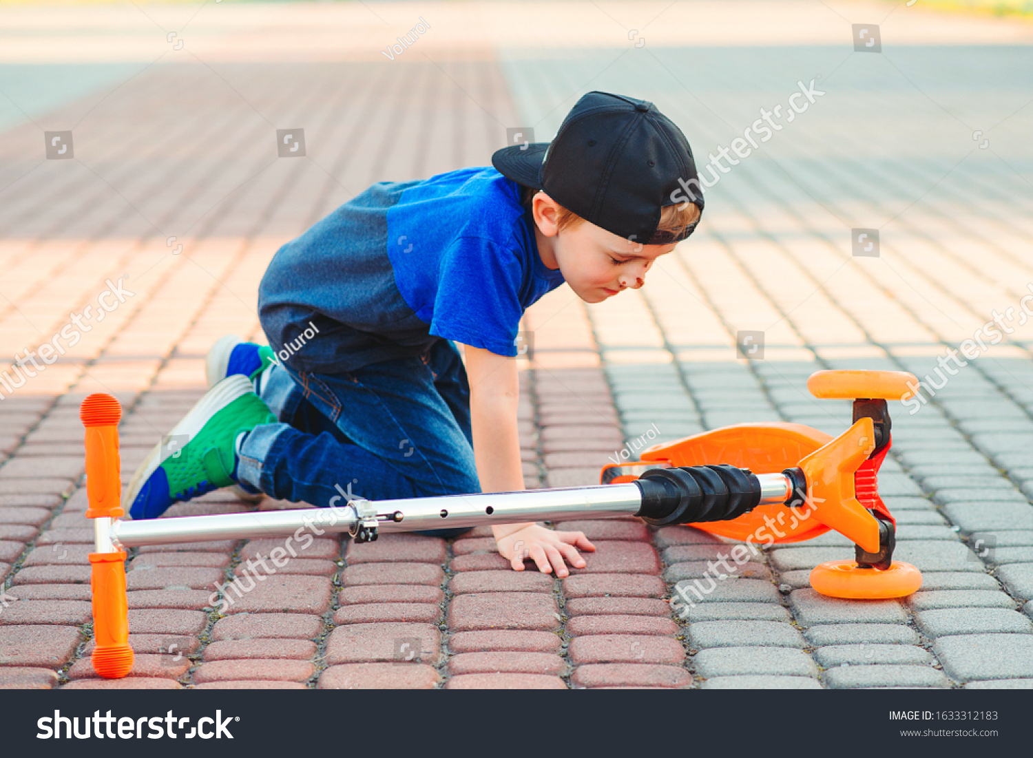 Boy Falling Off His Scooter Kid Stock Photo 1633312183 | Shutterstock