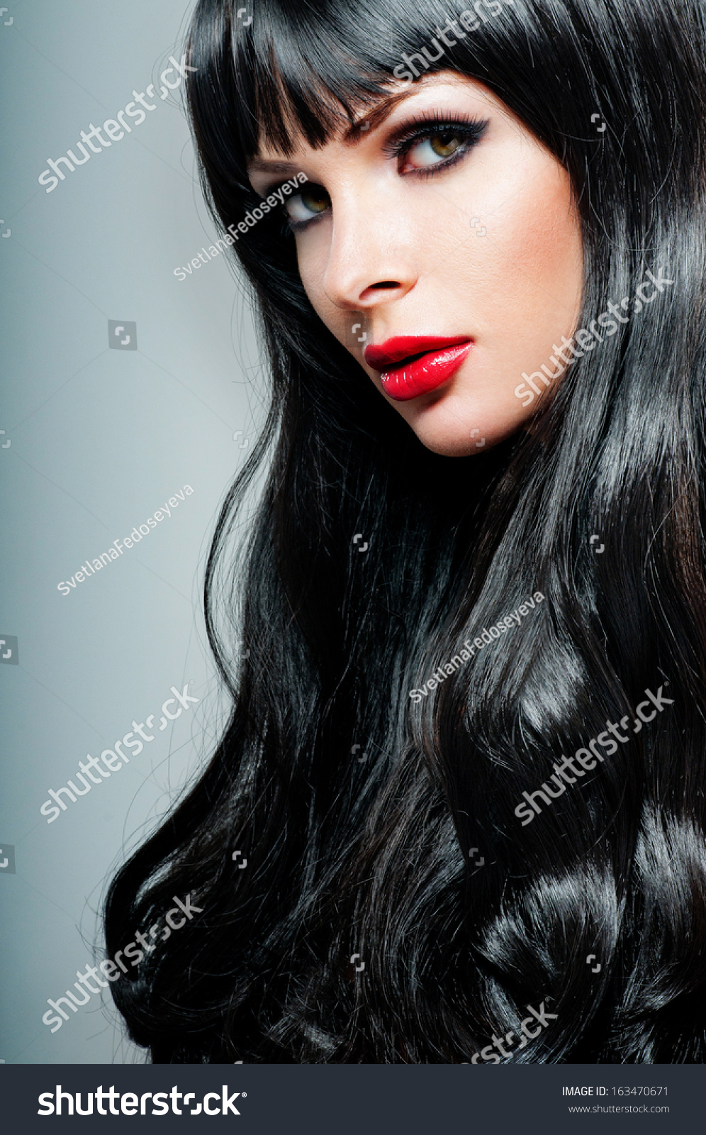 black hair and red lipstick