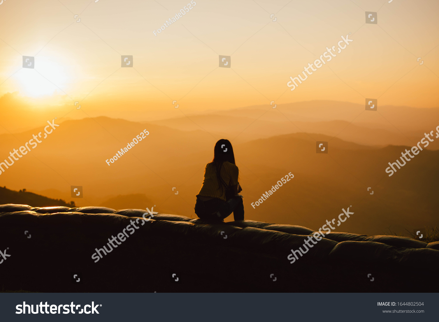 Silhouette Girl Sitting On Cliff Side Stock Photo 1644802504 | Shutterstock