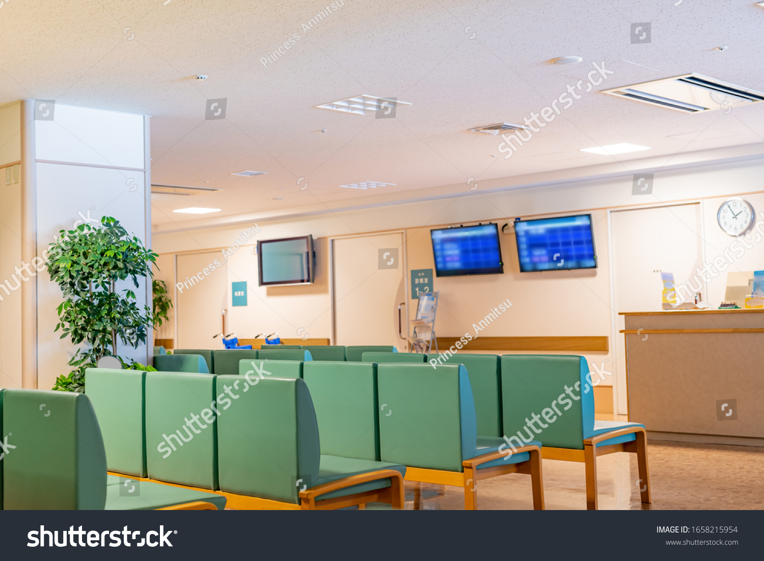 doctor-resting-alone-in-a-hospital-waiting-room-by-miquel-llonch