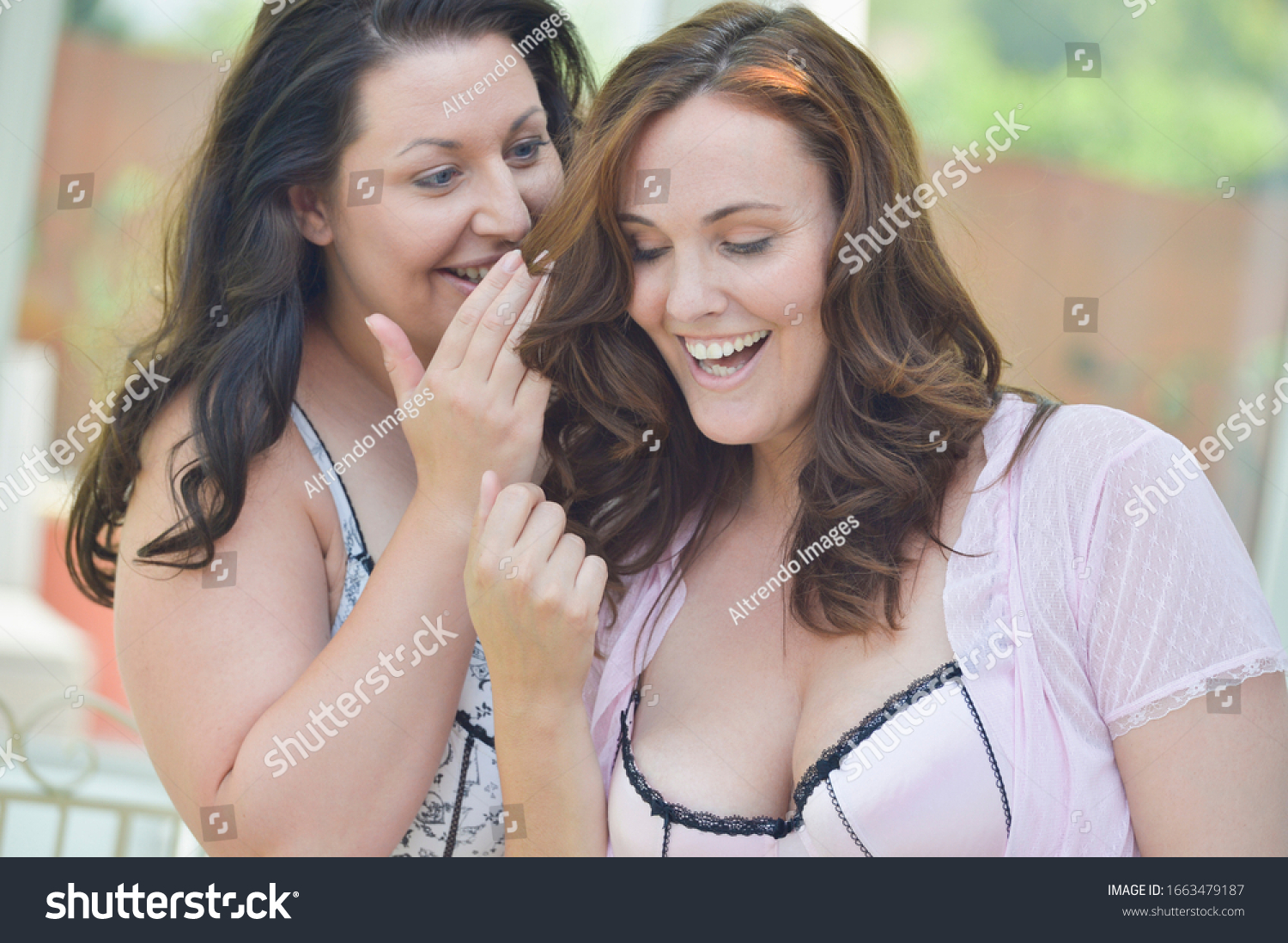 stock-photo-mid-adult-women-in-lingerie-laughing-1663479187.jpg