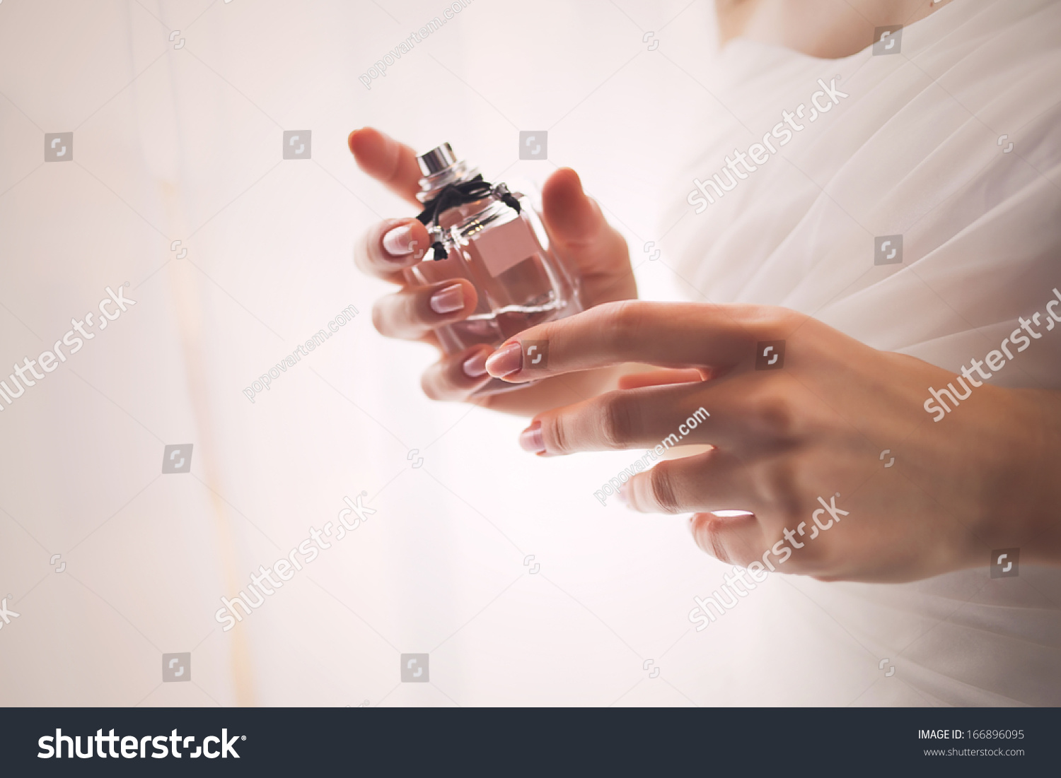 Woman Hands Holding Perfume Stock Photo 166896095 | Shutterstock