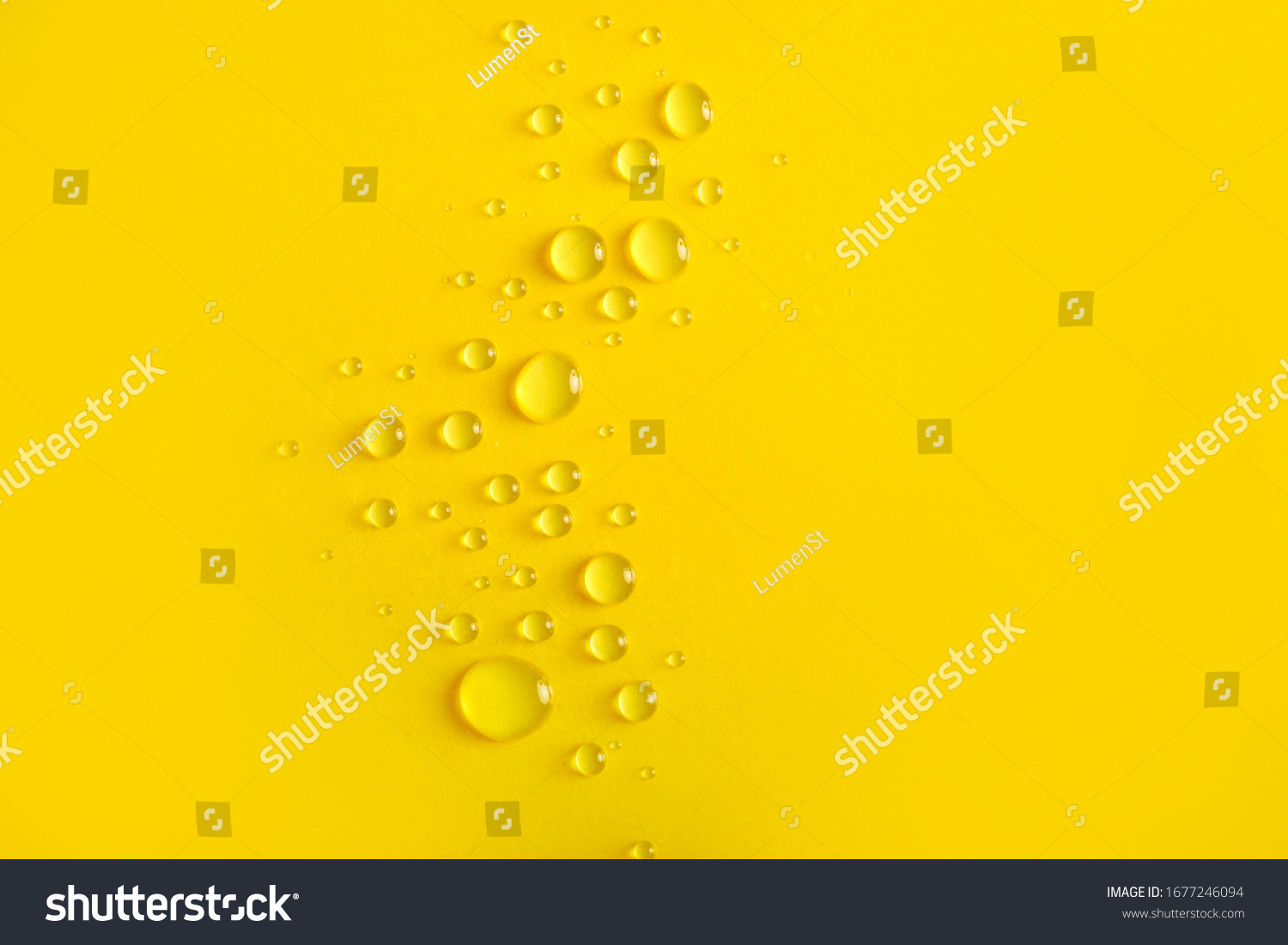 Water Drops On Yellow Background Stock Photo 1677246094 | Shutterstock