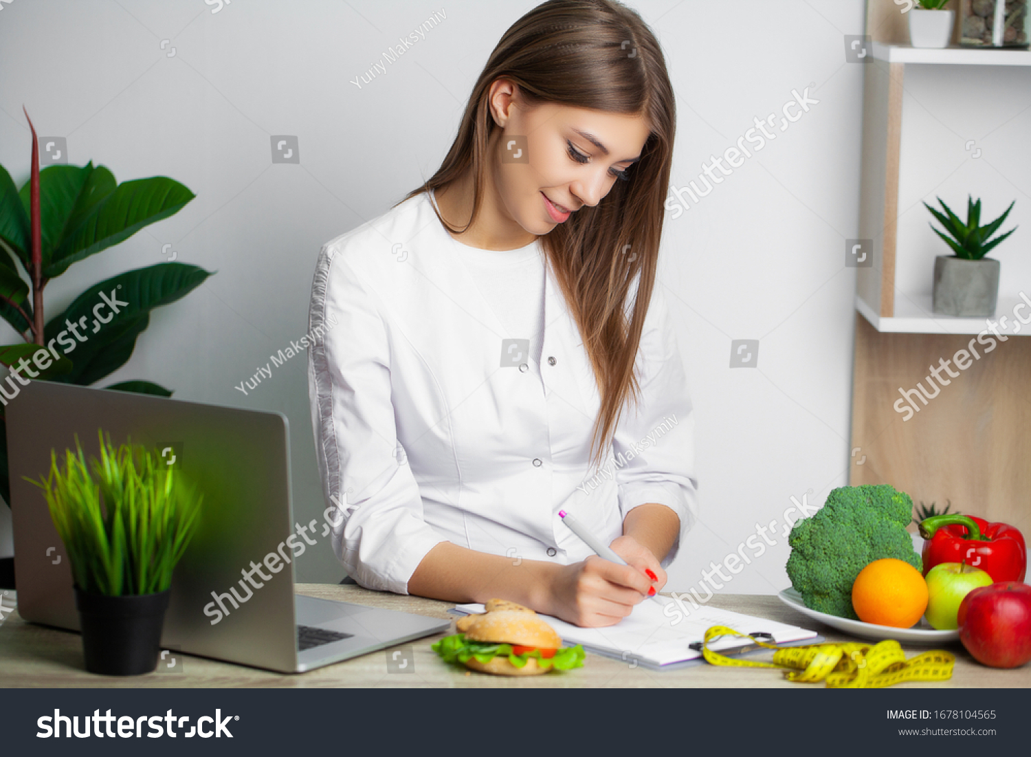 Woman White Coat Nutritionist Writes Healthy Stock Photo 1678104565 ...