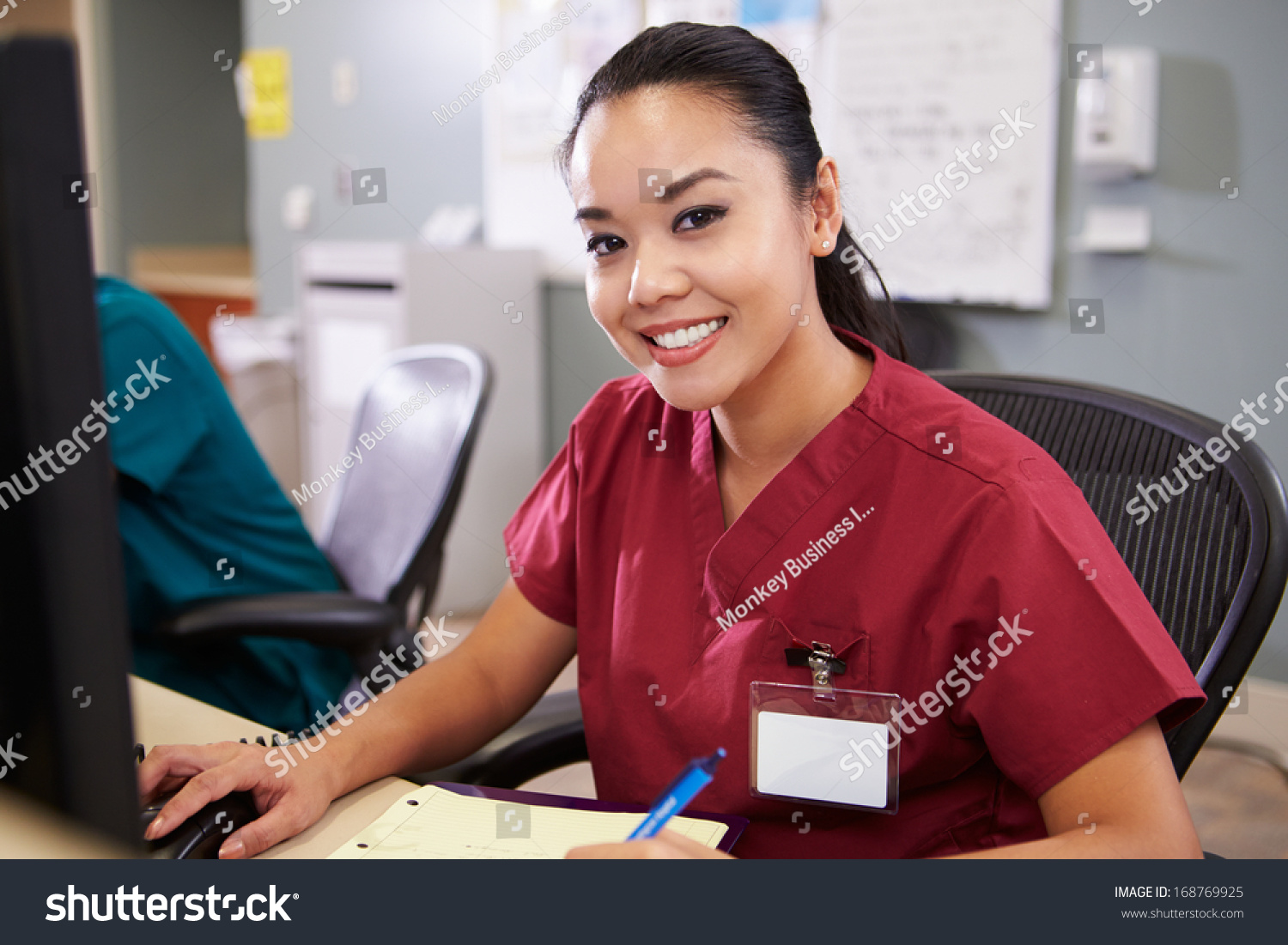 Portrait Female Nurse Working Nurses Station Stock Photo 168769925