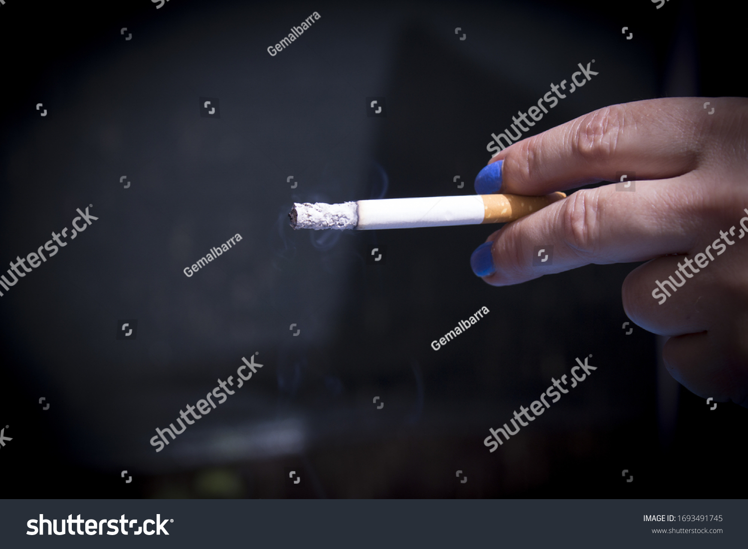 Womans Hand Holding Lit Cigarette Dark Stock Photo 1693491745 ...