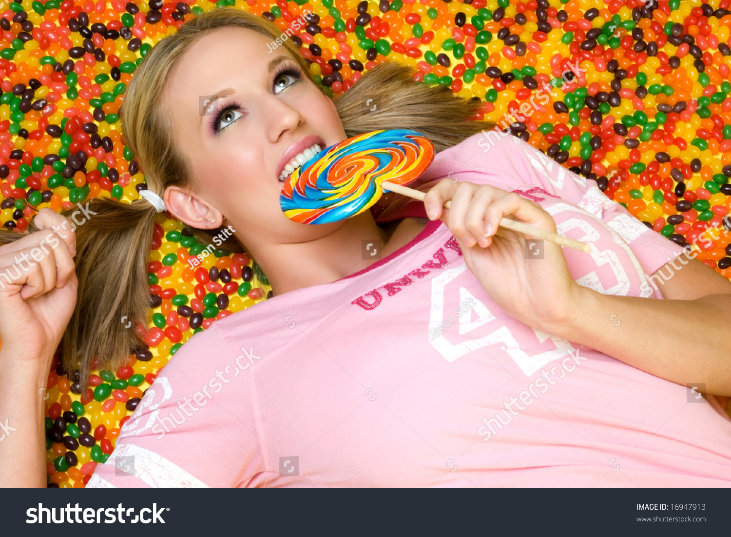 Girl Eating Candy Stock Photo 16947913 Shutterstock Girl Eating Candy Stock Photo 16947913 Shutterstock