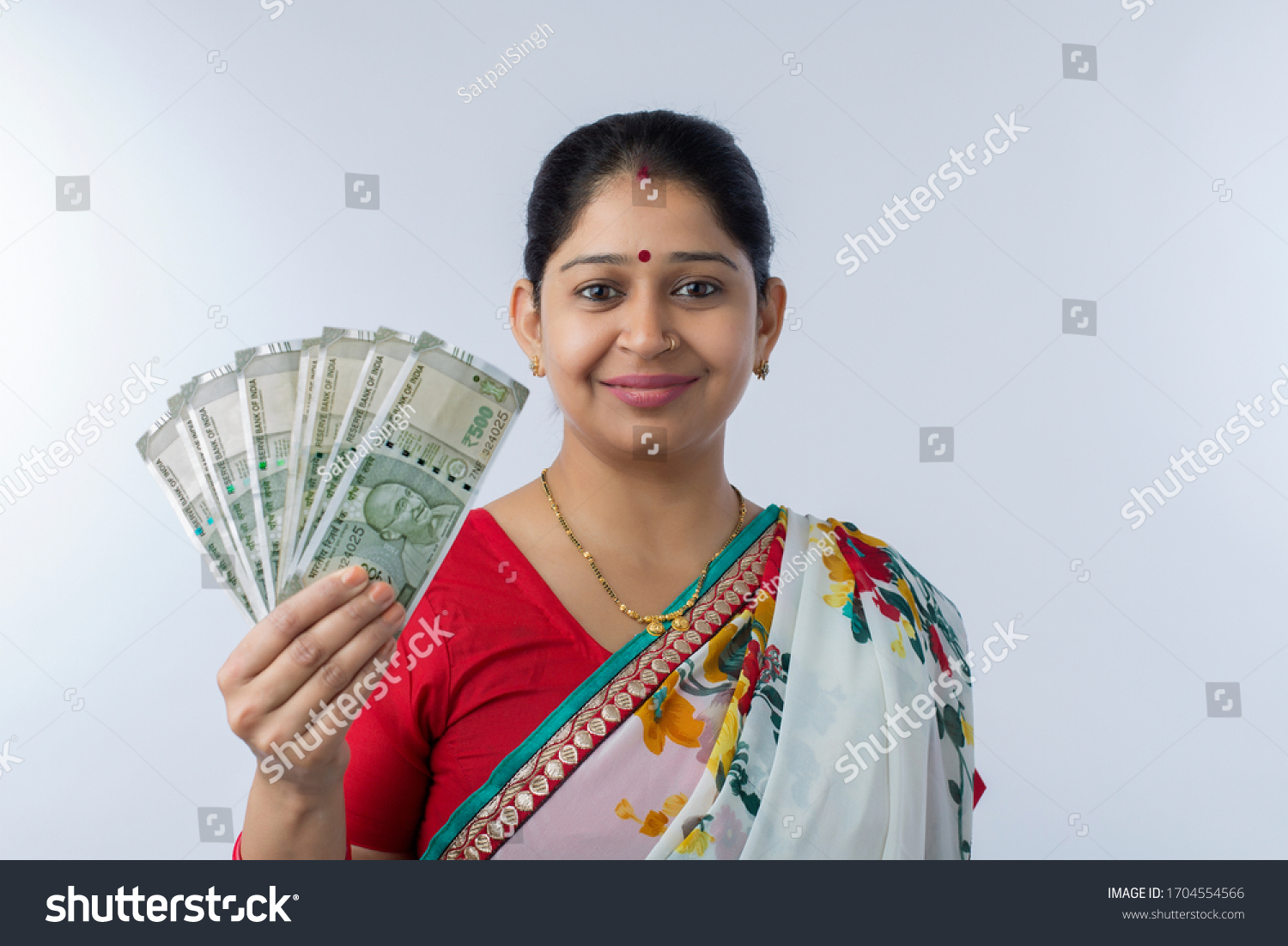 Young Indian Woman Holding Currency Notes Stock Photo 1704554566 ...