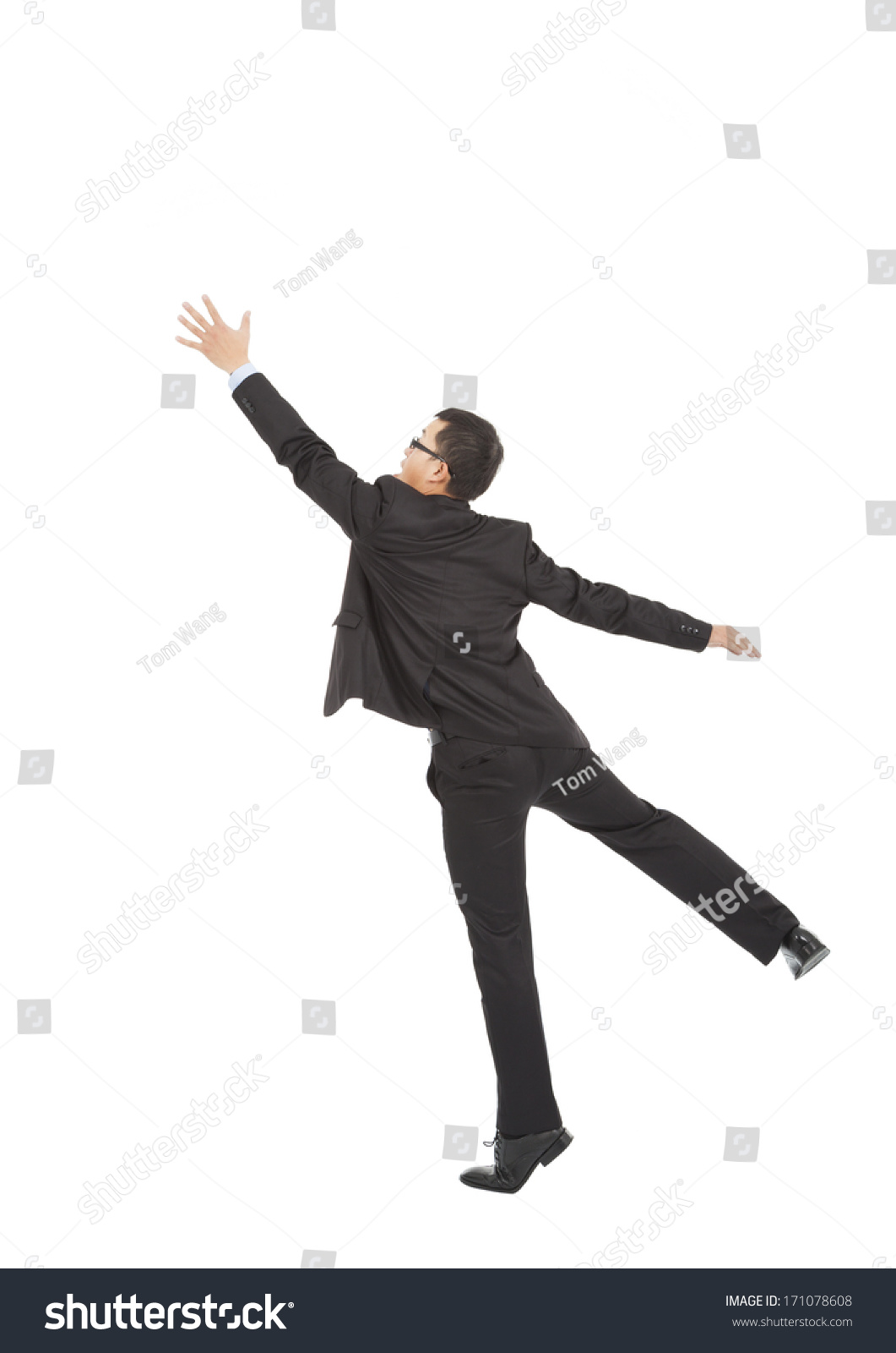 Businessman Jumping Grabbing Over White Background Stock Photo ...