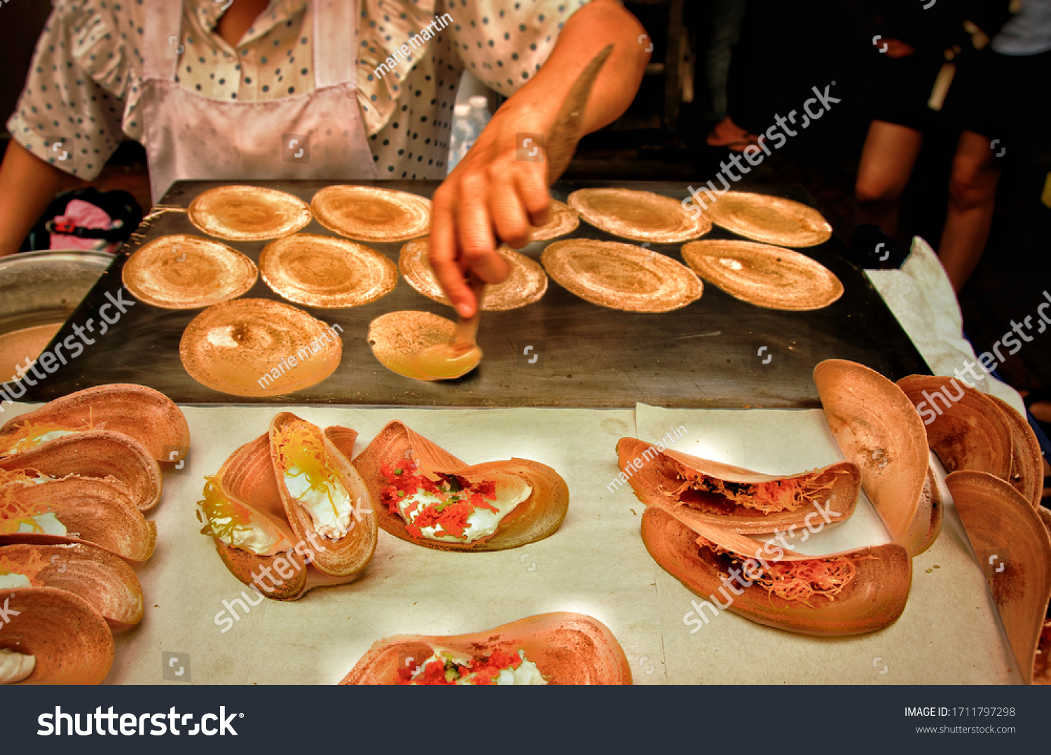 street-food-vendor-cooking-selling-traditional-stock-photo-1711797298