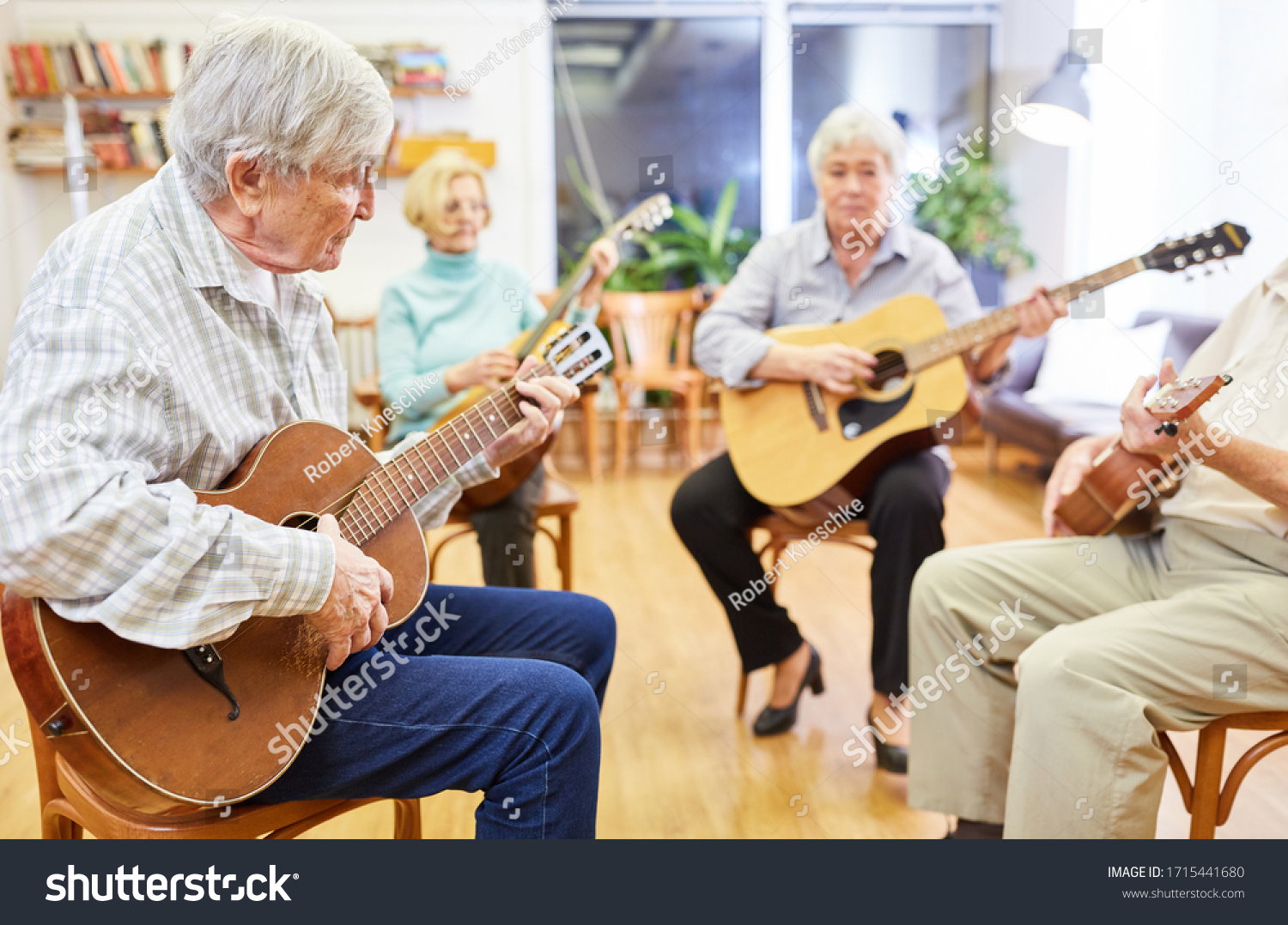 Group Of Seniors Takes Guitar Lessons In VHS Stock Photo   Image Of