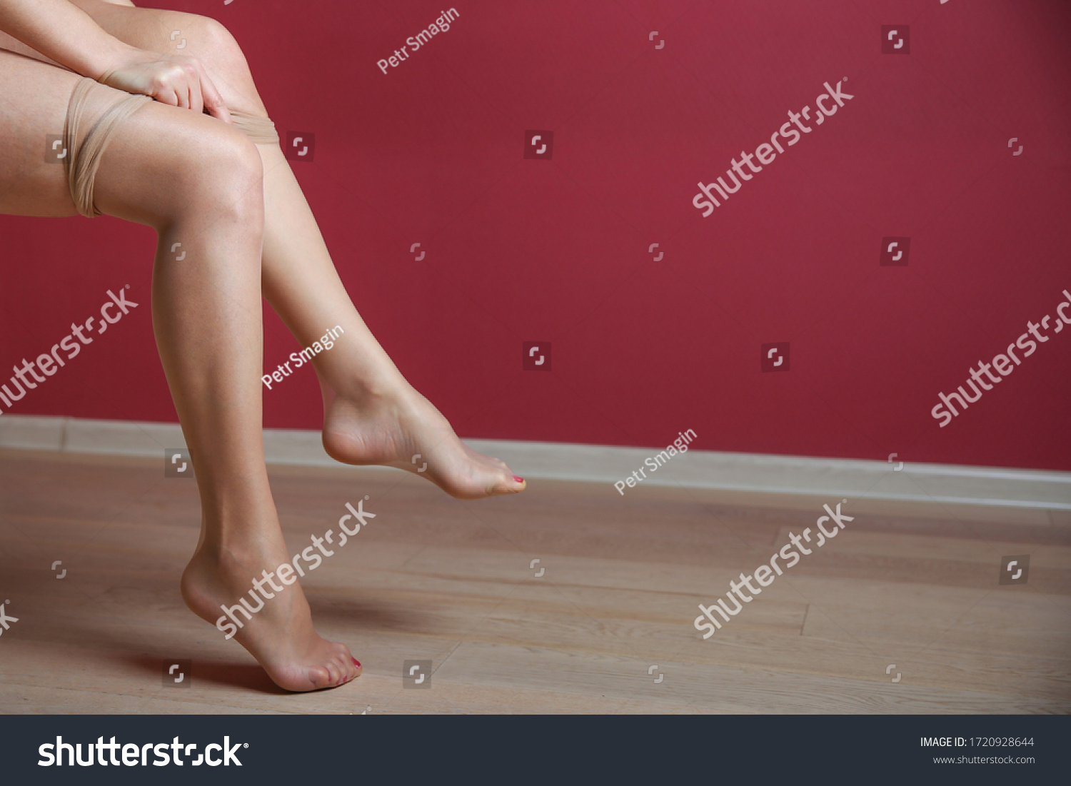 Woman Putting On Nude Sheer Tights Stock Photo Shutterstock