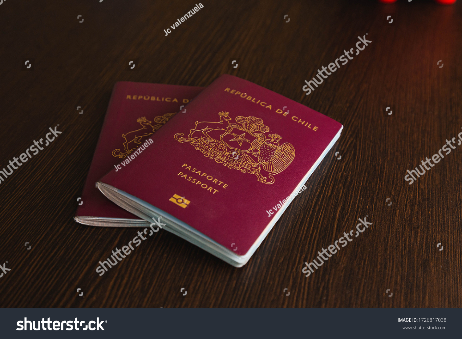 Two Red Chilean Passport Some Dollars Stock Photo 1726817038 Shutterstock   Stock Photo Two Red Chilean Passport With Some Dollars On A Desk 1726817038 