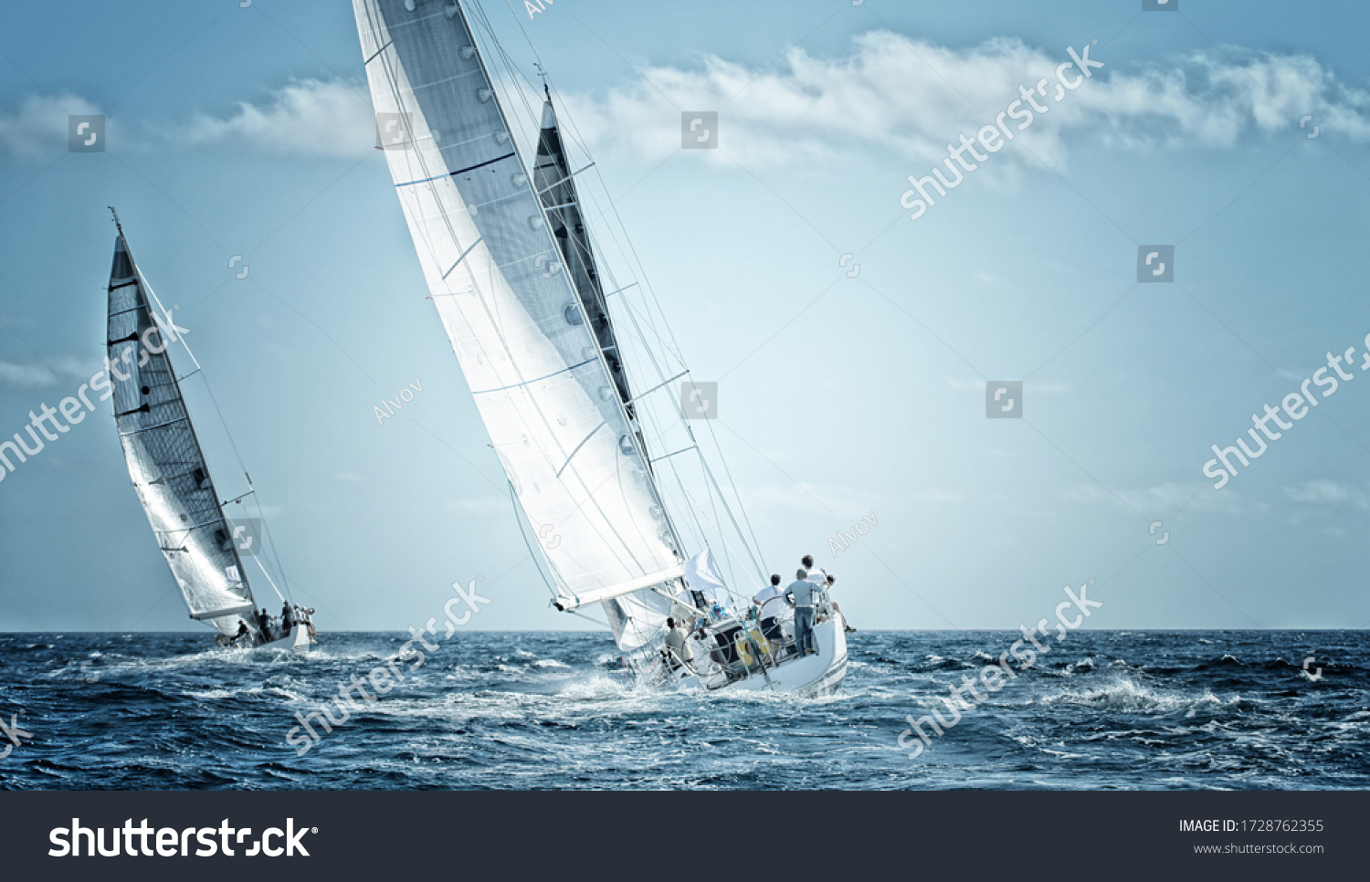 sailboats under sail