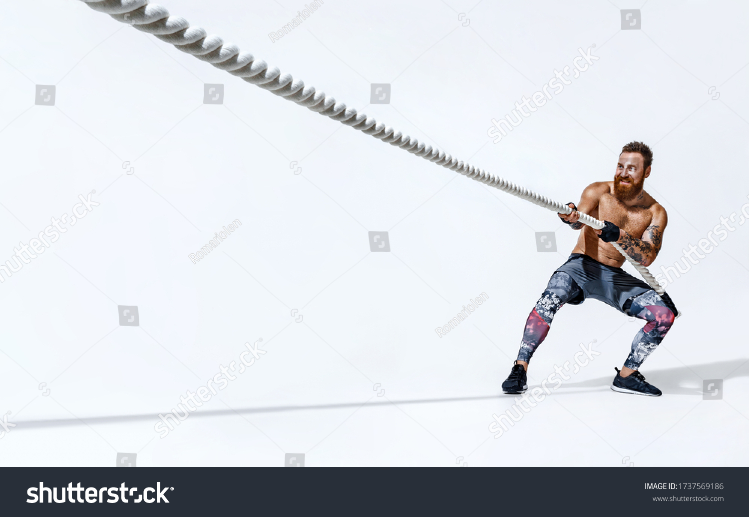 Strong Man Pulling Rope Photo Sporty Stock Photo 1737569186 | Shutterstock