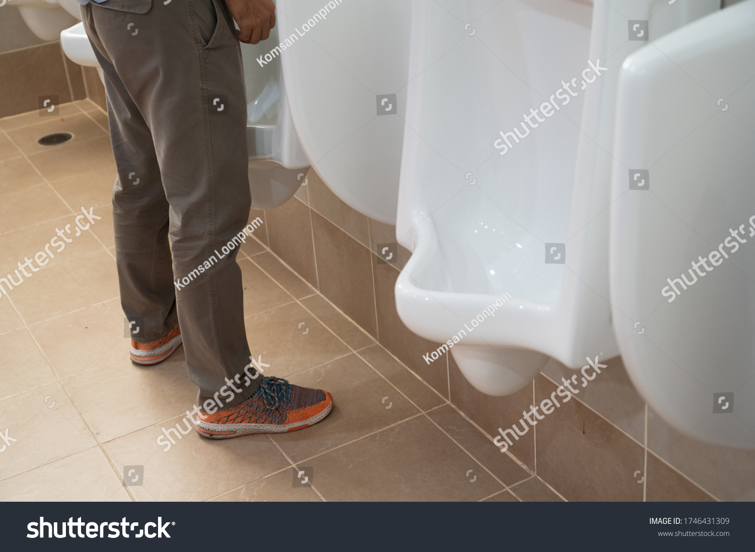 Man Standing Urinating Public Man Toiletwhite Stock Photo 1746431309 ...