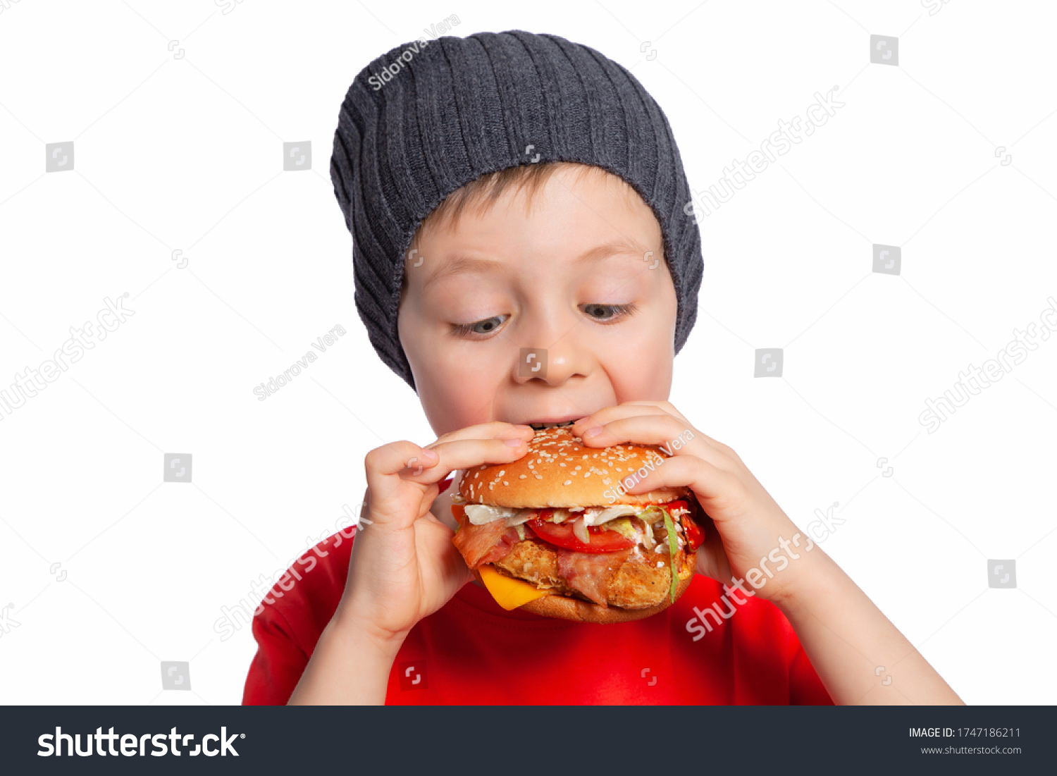 Child Eats Chicken Burger Boy Takes Stock Photo 1747186211 | Shutterstock