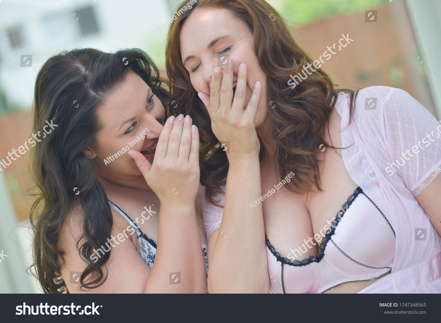 stock-photo-mid-adult-women-in-lingerie-laughing-together-1747348565.jpg