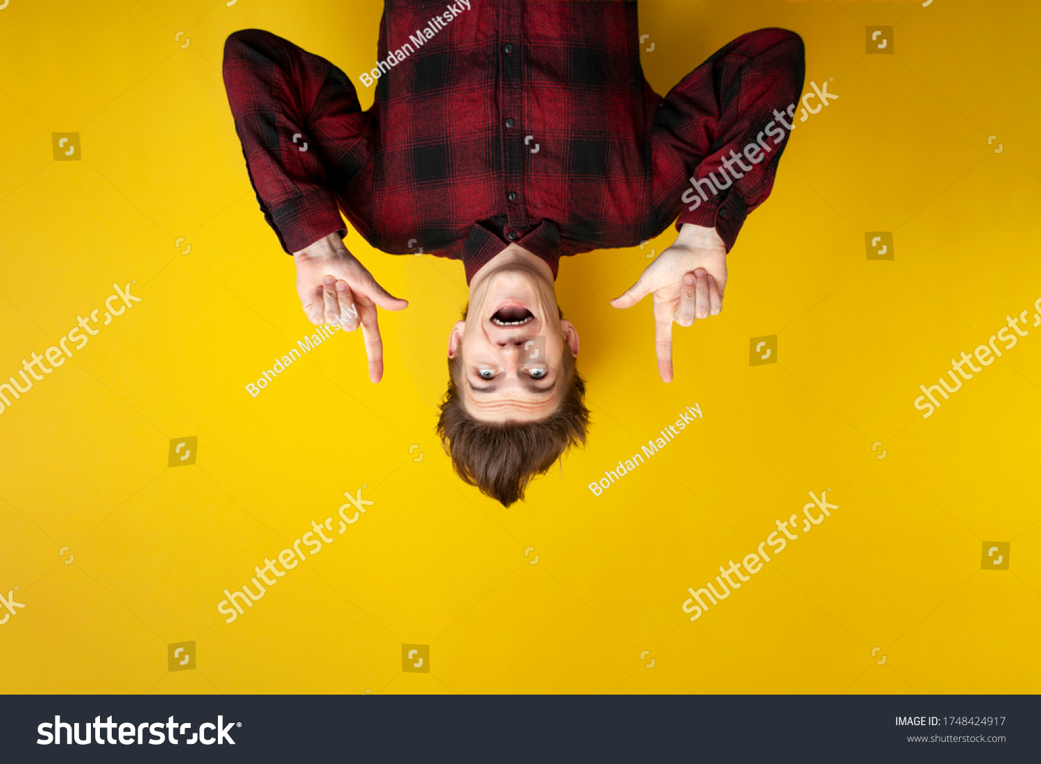 Young Shocked Guy Funny Hairstyle Shows Stock Photo 1748424917 ...