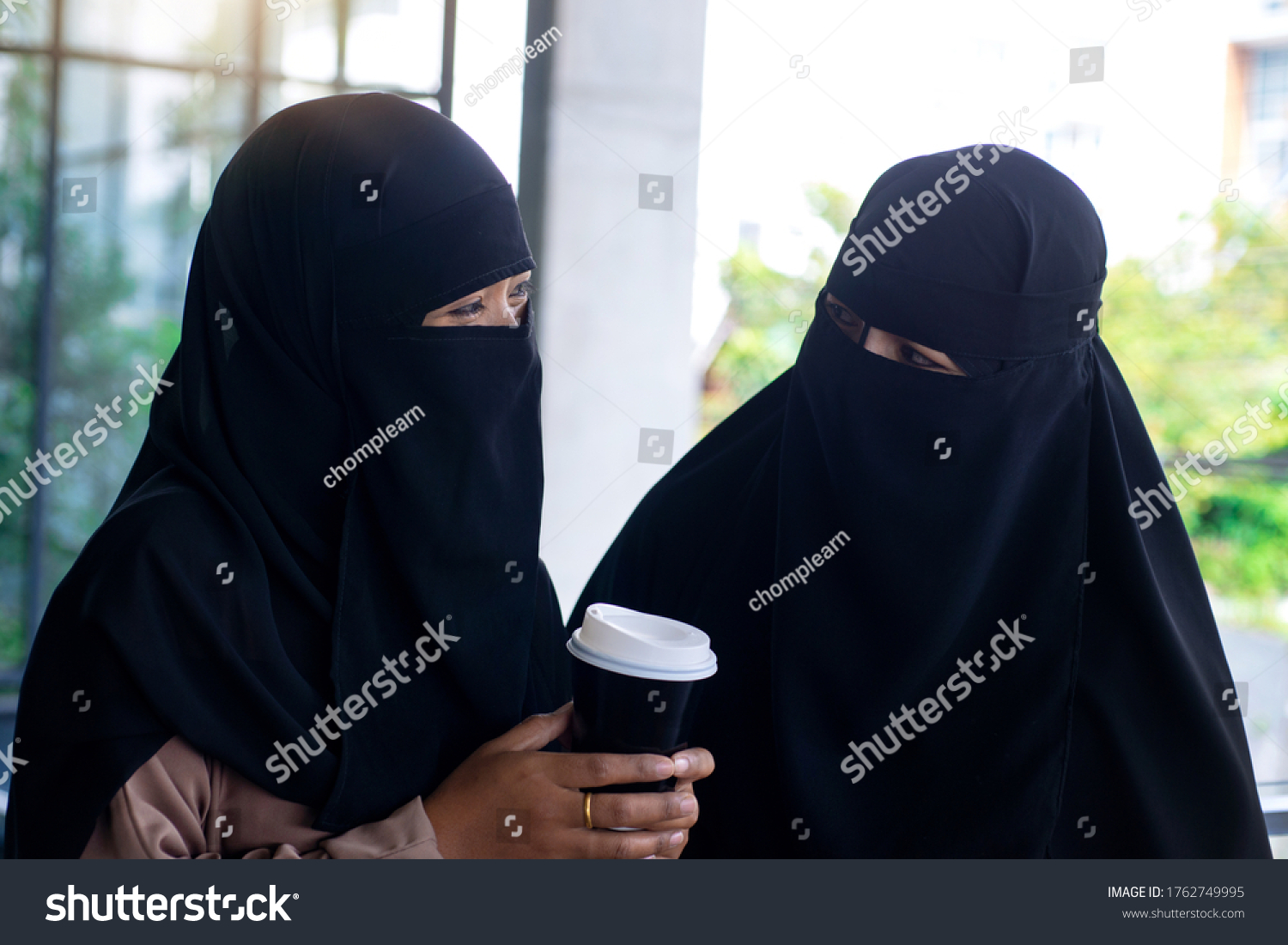 Arab Woman Wearing Niqab Showing Iftar