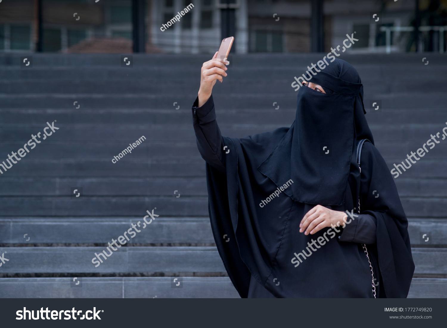Arab Muslim Woman Wearing Black Niqab picture