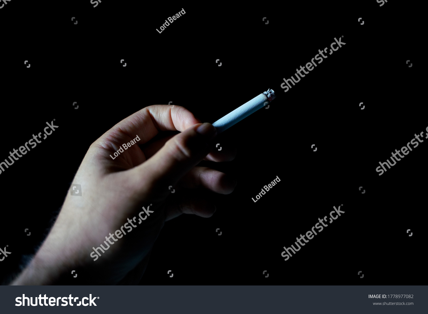 Male Hand Holding Cigarette Dark Background Stock Photo 1778977082 ...