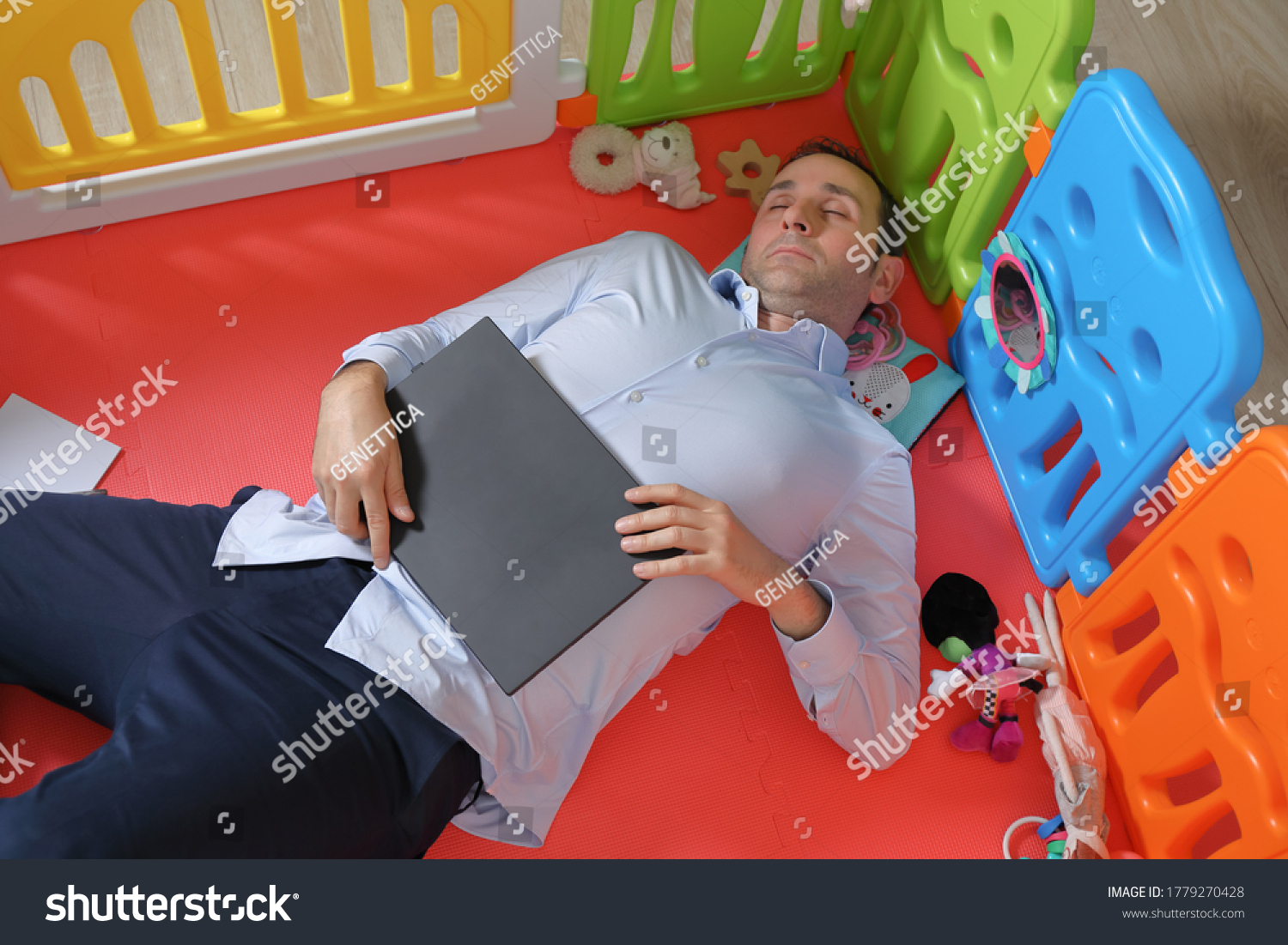 young-businessman-has-fallen-asleep-holding-stock-photo-1779270428