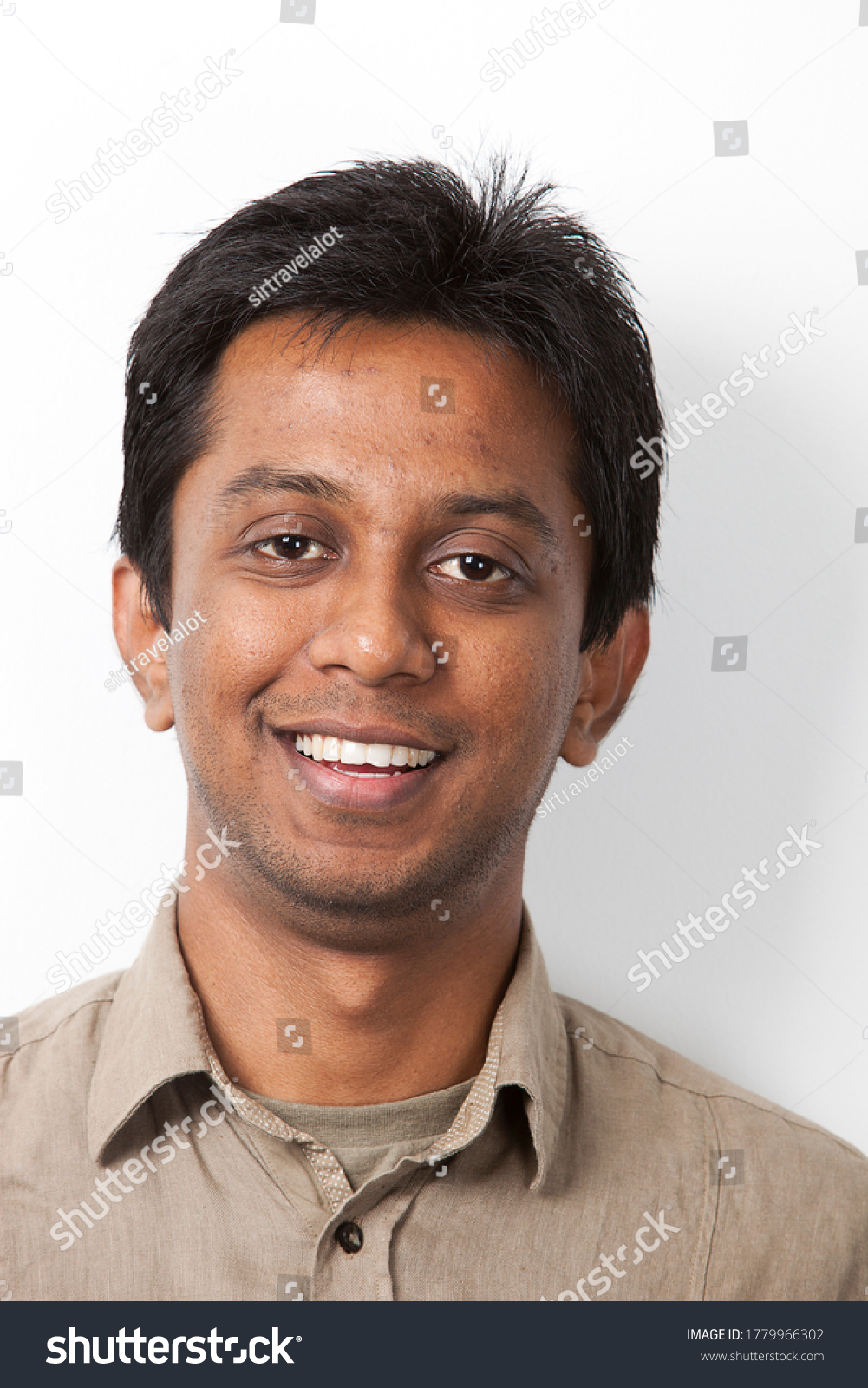 Portrait Young Indian Man Smiling Against Stock Photo 1779966302 ...