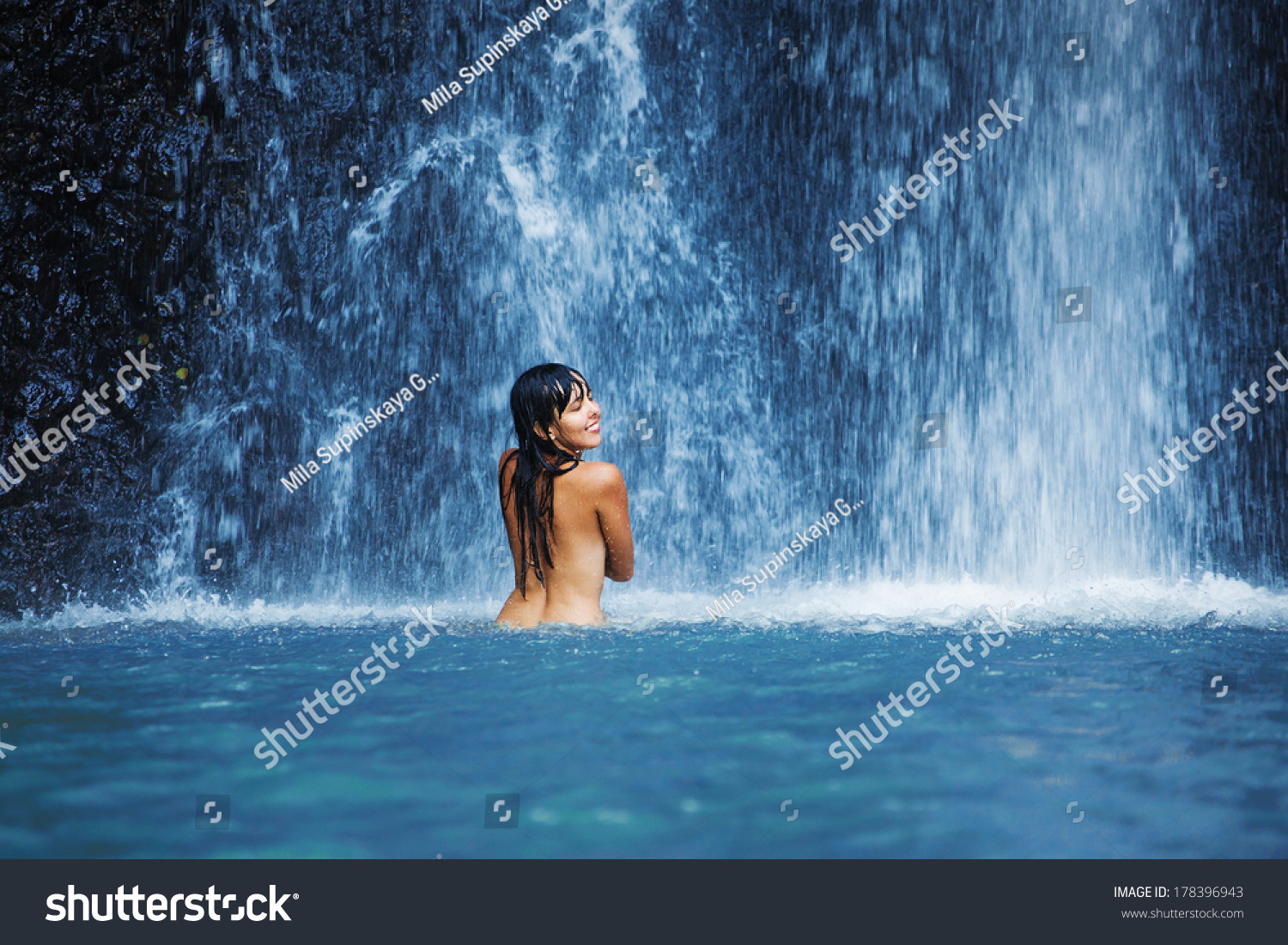 Naked Woman Washing Waterfall Stock